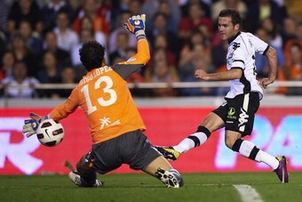 VALENCIA, SPAIN - APRIL 10: Juan Mata of Valencia scored the second goal during the La Liga match between Valencia and Villarreal at Estadio Mestalla on April 10, 2011 in Valencia, Spain.  (Photo by Manuel Queimadelos Alonso/Getty Images)
