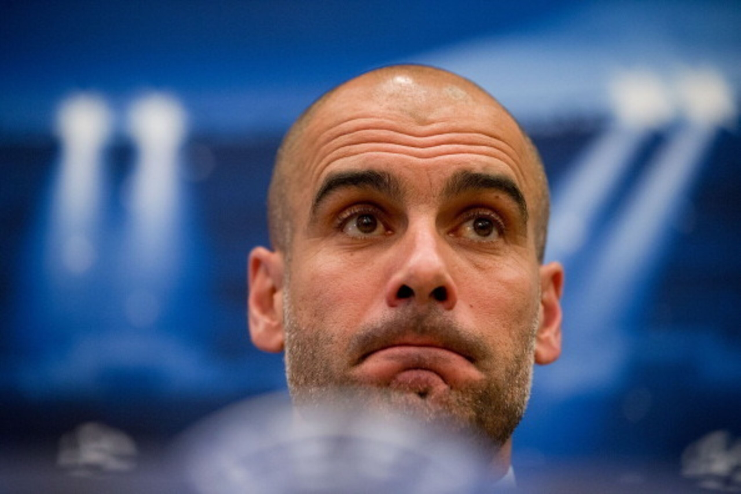MADRID, SPAIN - APRIL 22:  Coach Pep Guardiola of FC Bayern Munich attends a press conference, on the eve of the UEFA Champions League semi-final first leg match against Real Madrid CF, at Intercontinental Hotel on April 22, 2014 in Madrid, Spain.  (Photo