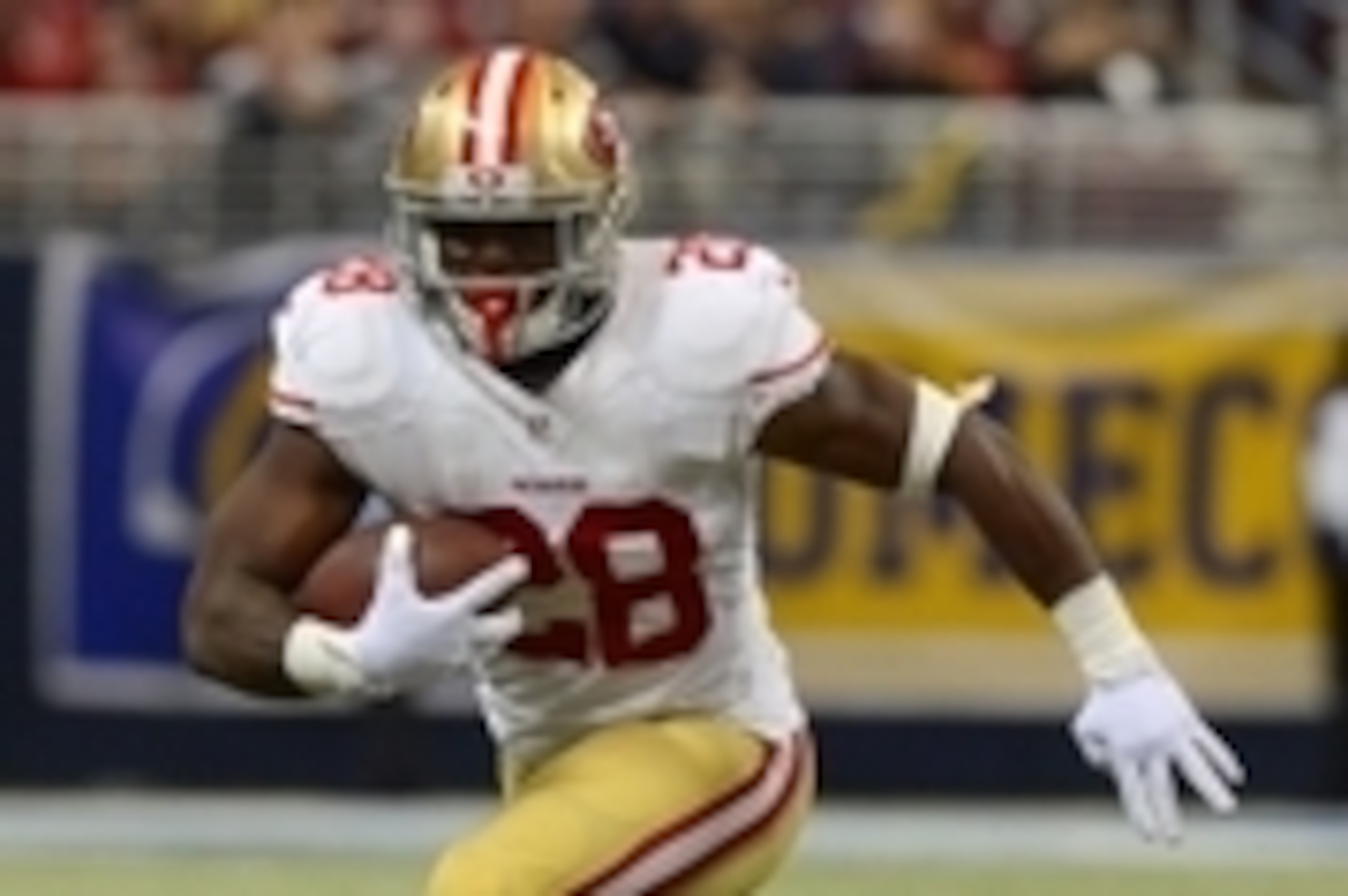Oct 13, 2014; St. Louis, MO, USA; San Francisco 49ers running back Carlos Hyde (28) carries the ball during the second half against the St. Louis Rams at the Edward Jones Dome. San Francisco defeated St. Louis 31-17. Mandatory Credit: Jeff Curry-USA TODAY