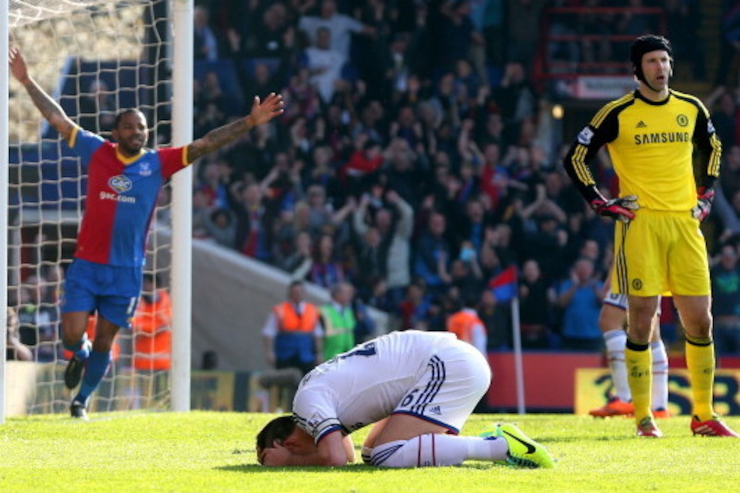 LONDON, ENGLAND - MARCH 29:  A dejected John Terry (C) of Chelsea reacts after opening the scoring with an own goal during the Barclays Premier League match between Crystal Palace and Chelsea at Selhurst Park on March 29, 2014 in London, England.  (Photo 