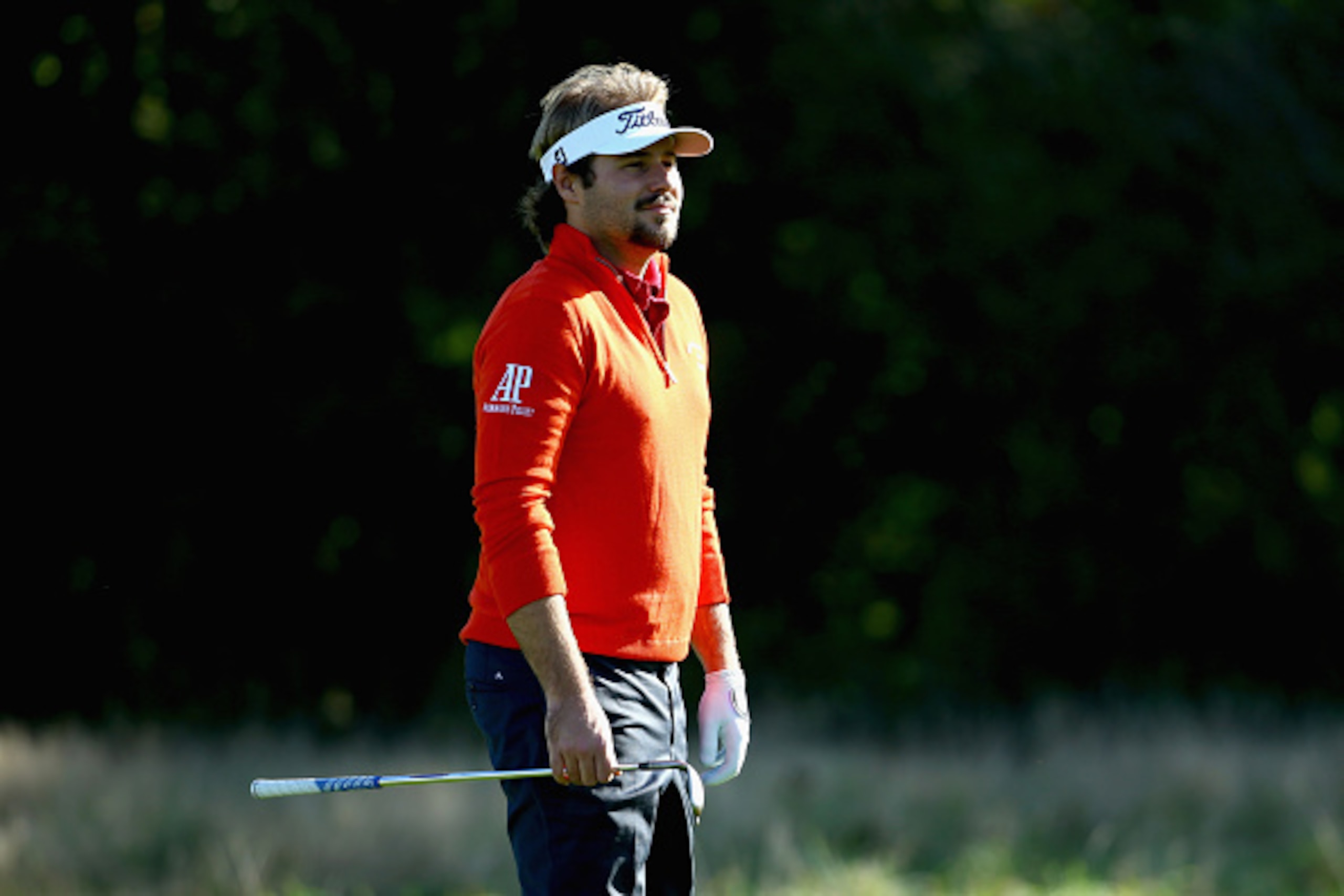 ASH, ENGLAND - OCTOBER 16:  Victor Dubuisson of France walks up the 2nd hole during his first round match against Shane Lowry of Ireland at the Volvo World Matchplay Championship at The London Club on October 16, 2014 in Ash, England.  (Photo by Richard H