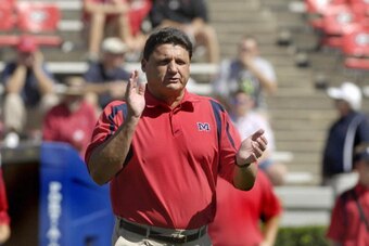 ATHENS, GA - SEPTEMBER 29: Coach Ed Orgeron of the Mississippi Rebels applauds play against the Georgia Bulldogs at Sanford Stadium on September 29, 2007 in Athens, Georgia.  Georgia won 45 - 17. (Photo by Al Messerschmidt/Getty Images)
