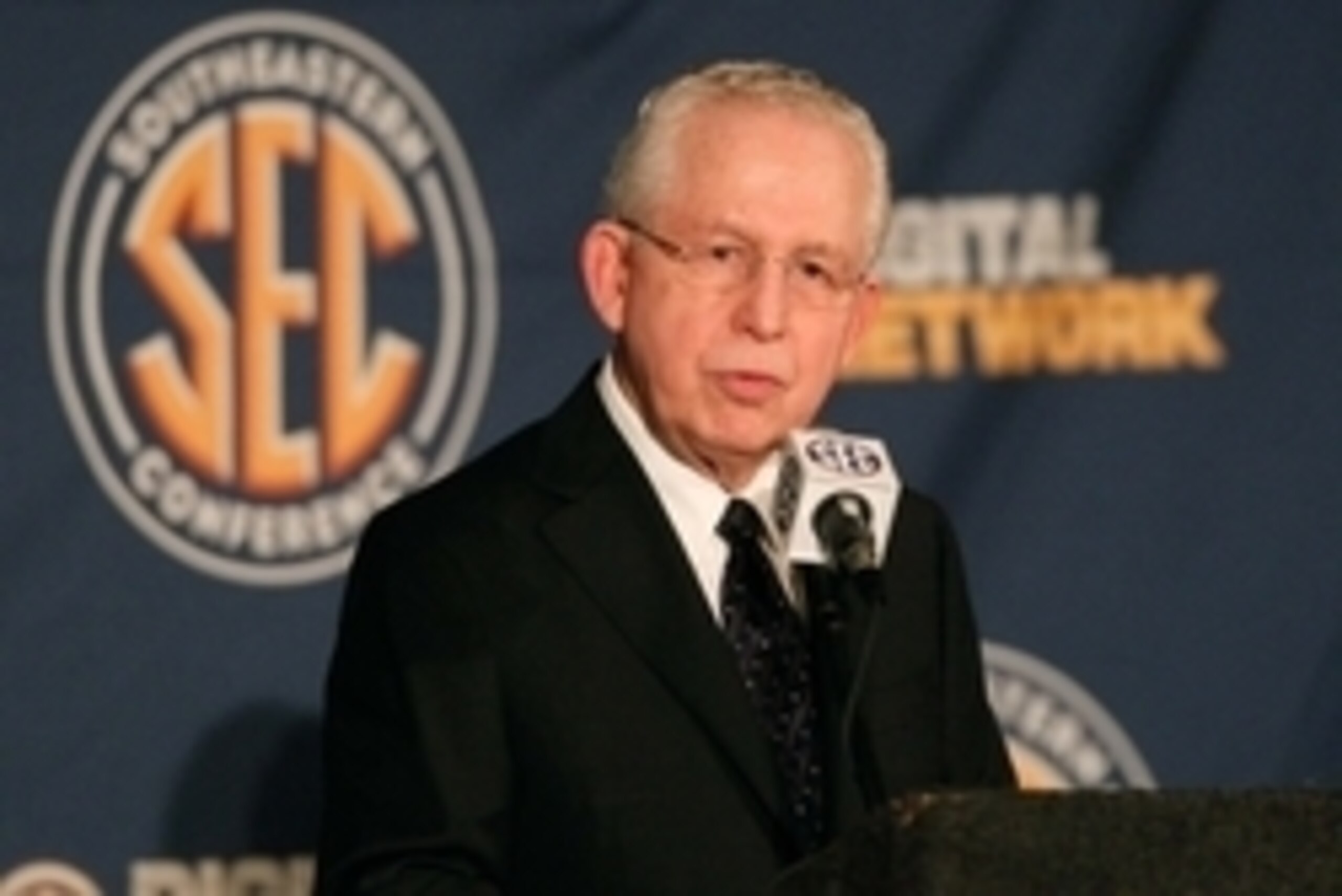 Jul 16, 2013; Hoover, AL, USA;  SEC commissioner Mike Slive talks with the media during the 2013 SEC football media days at the Hyatt Regency. Mandatory Credit: Marvin Gentry-USA TODAY Sports