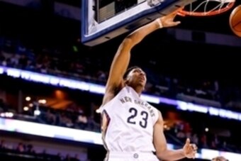 Oct 14, 2014; New Orleans, LA, USA; New Orleans Pelicans forward Anthony Davis (23) dunks the ball against the Houston Rockets during the first quarter at the Smoothie King Center. Mandatory Credit: Derick E. Hingle-USA TODAY Sports