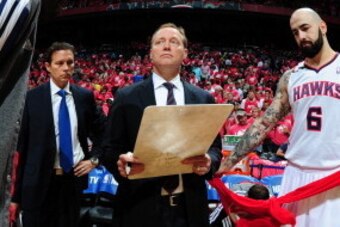 ATLANTA, GA - MAY 1:  Mike Budenholzer of the Atlanta Hawks draws up plays before the game against the Indiana Pacers in Game Six of the Eastern Conference Quarterfinals on May 1, 2014 at Philips Arena in Atlanta, Georgia.  NOTE TO USER: User expressly ac