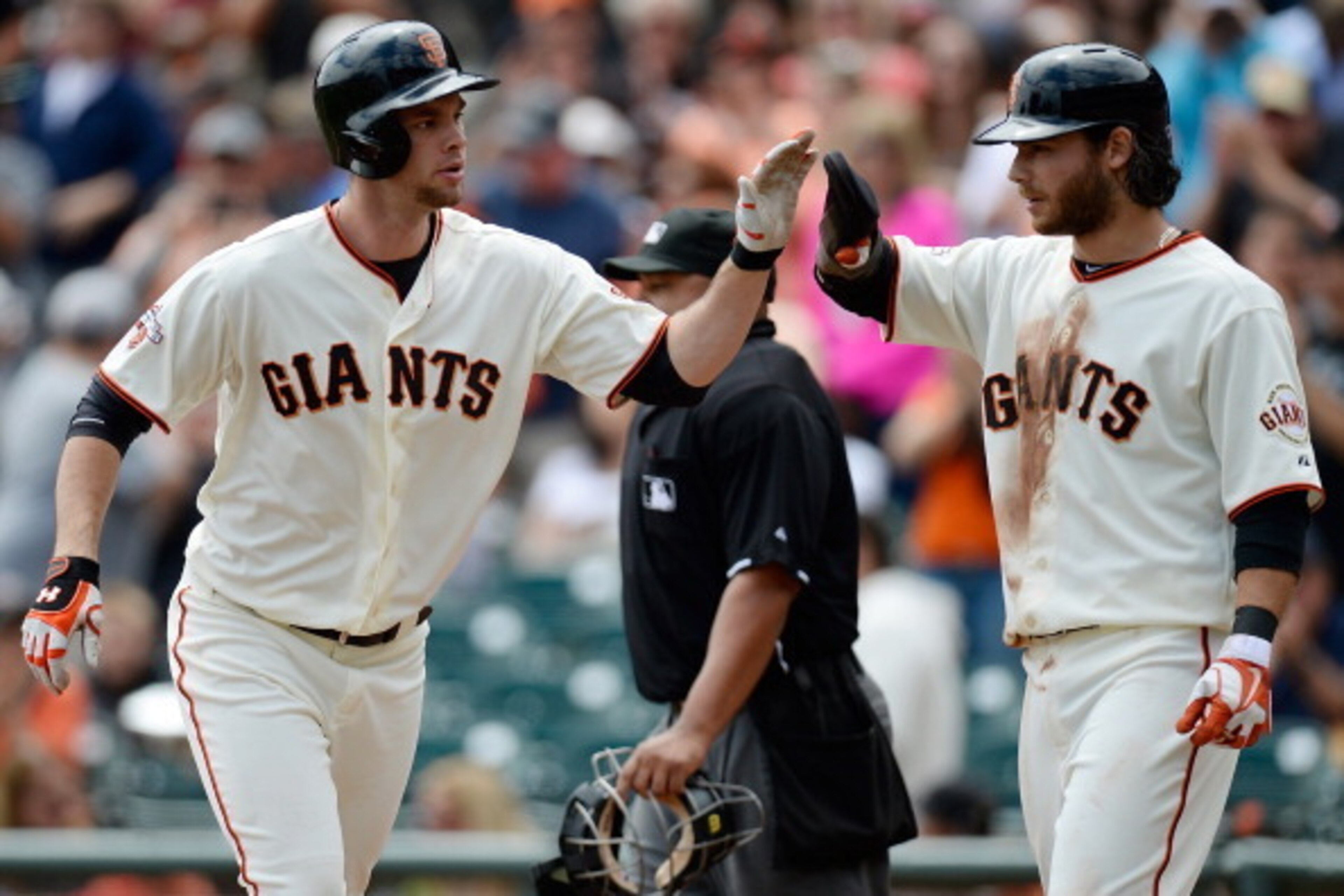 SAN FRANCISCO, CA - AUGUST 08: Brandon Belt #9 (L) of the San Francisco Giants is congratulated by Brandon Crawford #35 (R) after Belt hit a three-run homer in the first inning against the Milwaukee Brewers at AT&T Park on August 8, 2013 in San Francisco SAN FRANCISCO, CA - AUGUST 08: Brandon Belt #9 (L) of the San Francisco Giants is congratulated by Brandon Crawford #35 (R) after Belt hit a three-run homer in the first inning against the Milwaukee Brewers at AT&T Park on August 8, 2013 in San Francisco