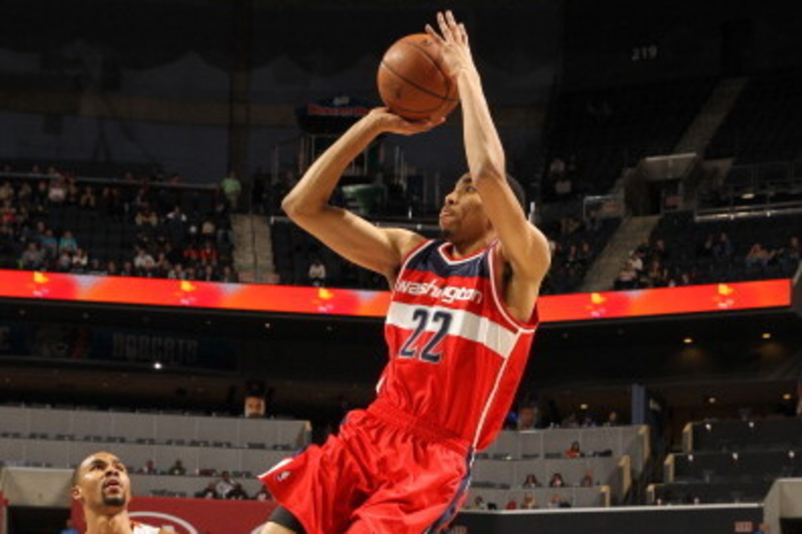 CHARLOTTE, NC - JANUARY 7:  Otto Porter #22 of the Washington Wizards shoots against the Charlotte Bobcats during the game at the Time Warner Cable Arena on January 7, 2014 in Charlotte, North Carolina.  NOTE TO USER: User expressly acknowledges and agree