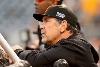 PITTSBURGH, PA - OCTOBER 01:  Manager Bruce Bochy #15 of the San Francisco Giants looks on during batting practice prior to their National League Wild Card game against the Pittsburgh Pirates at PNC Park on October 1, 2014 in Pittsburgh, Pennsylvania.  (P