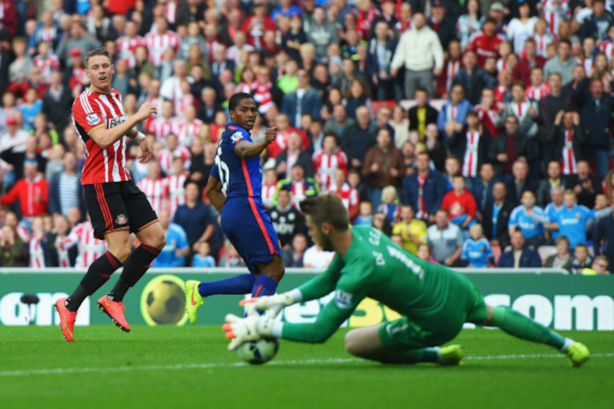 SUNDERLAND, ENGLAND - AUGUST 24: Connor Wickham of Sunderland has his shot saved by David De Gea of Manchester United during the Barclays Premier League match between Sunderland and Manchester United at Stadium of Light on August 24, 2014 in Sunderland, E