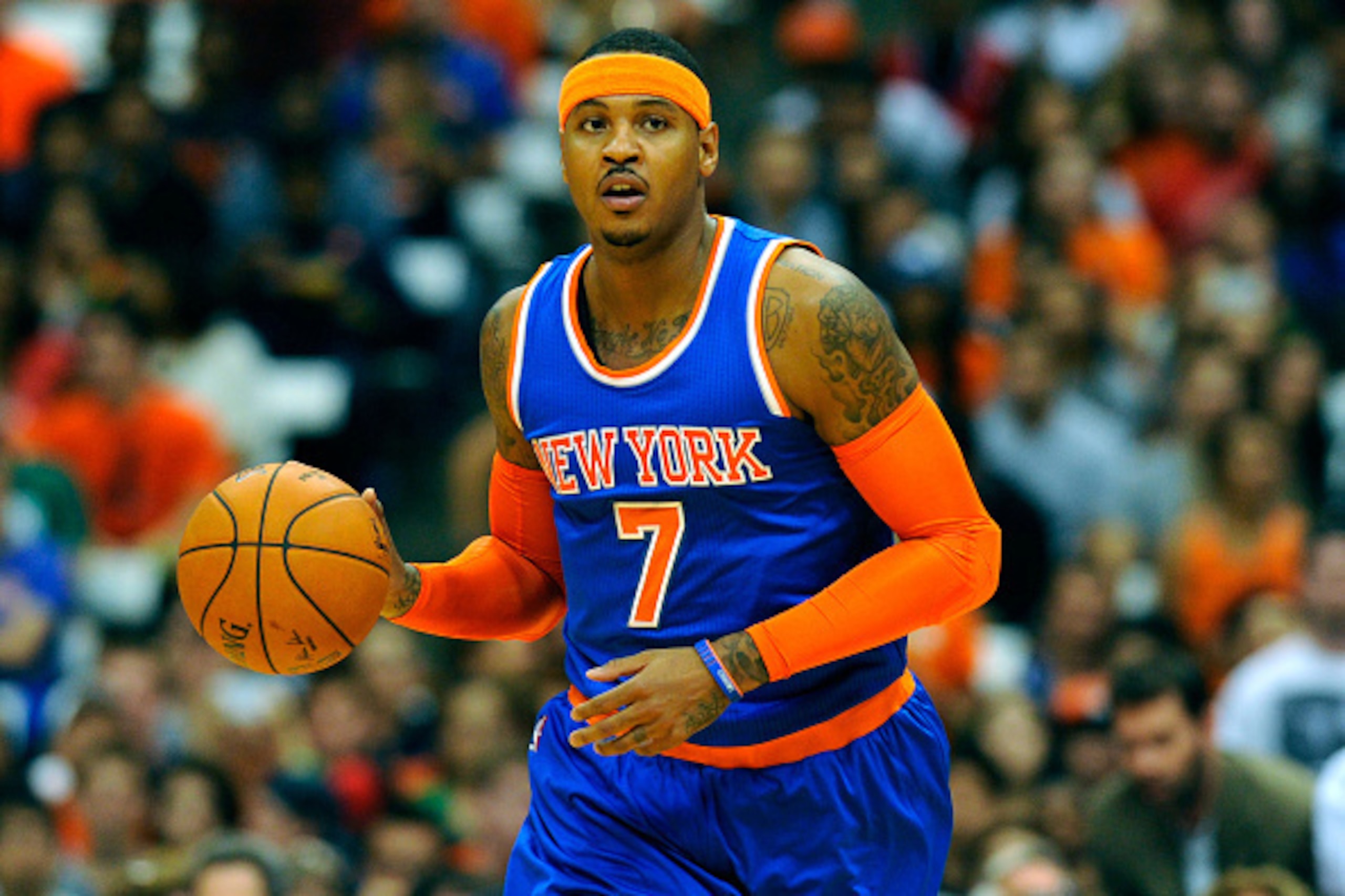 SYRACUSE, NY - OCTOBER 14:  Carmelo Anthony #7 of the New York Knicks dribbles the ball up the court during a preseason game at the Carrier Dome on October 14, 2014 in Syracuse, New York.  The Knicks defeated the 76ers 84-77.  NOTE TO USER: User expressly