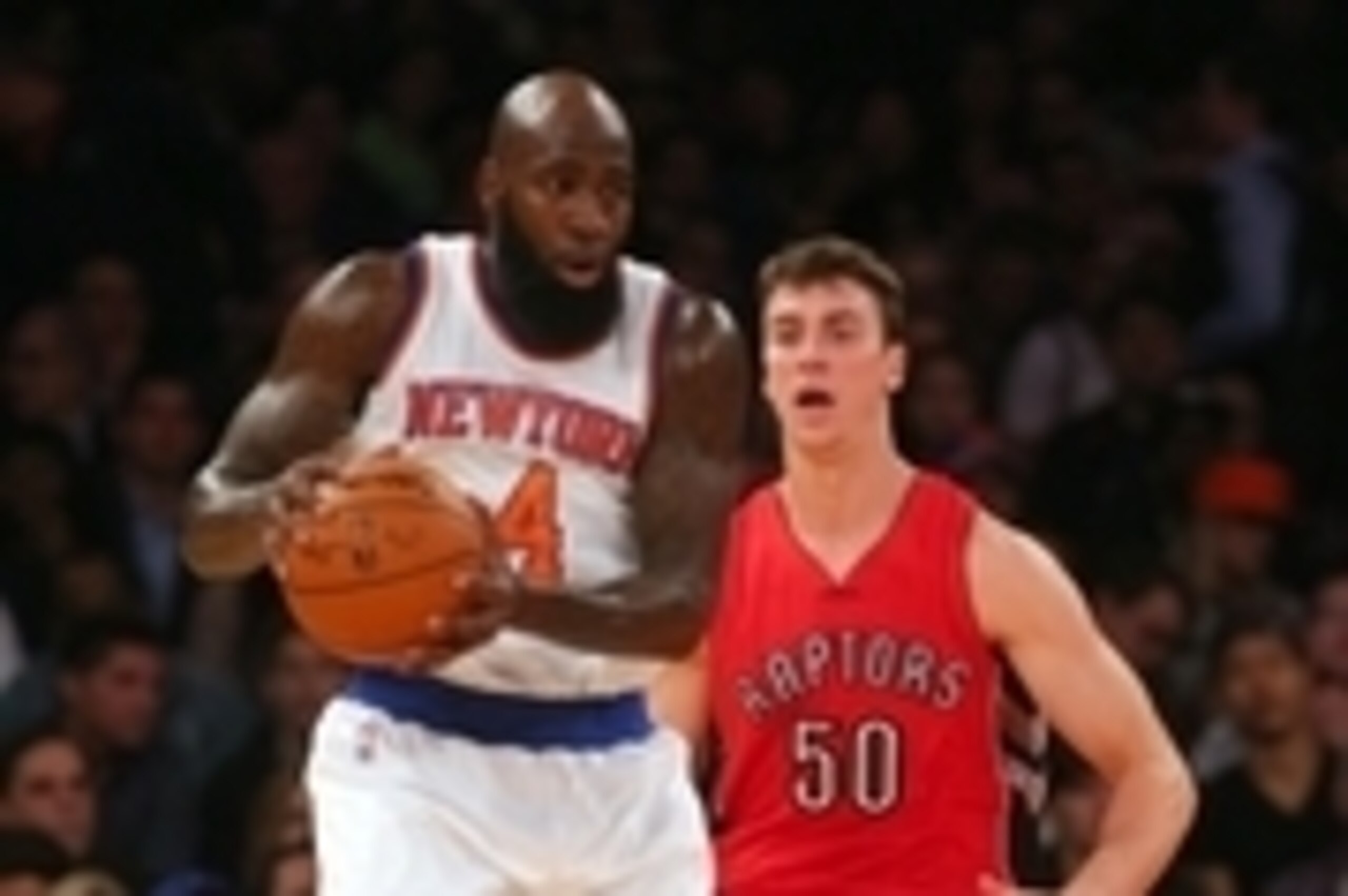 Oct 13, 2014; New York, NY, USA; New York Knicks small forward Quincy Acy (4) controls the ball against Toronto Raptors power forward Tyler Hansbrough (50) during the first quarter at Madison Square Garden. Mandatory Credit: Brad Penner-USA TODAY Sports