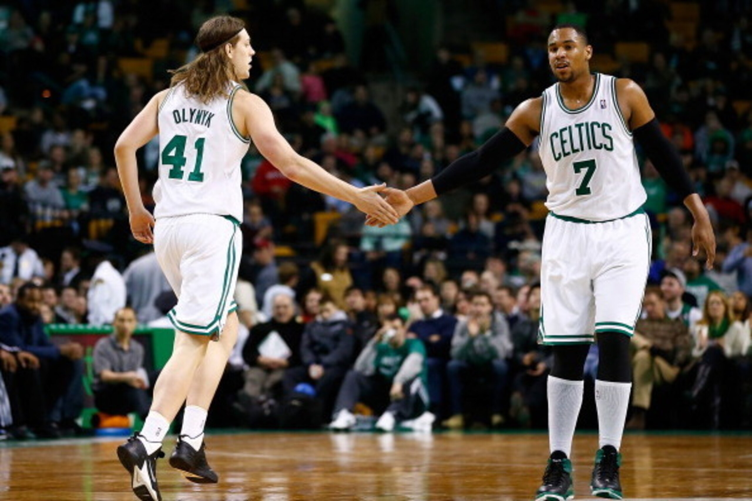 BOSTON, MA - DECEMBER 16: Kelly Olynyk #41 and Jared Sullinger #7 of the Boston Celtics react following a basket in the second quarter against the Minnesota Timberwolves during the game at TD Garden on December 16, 2013 in Boston, Massachusetts. NOTE TO U