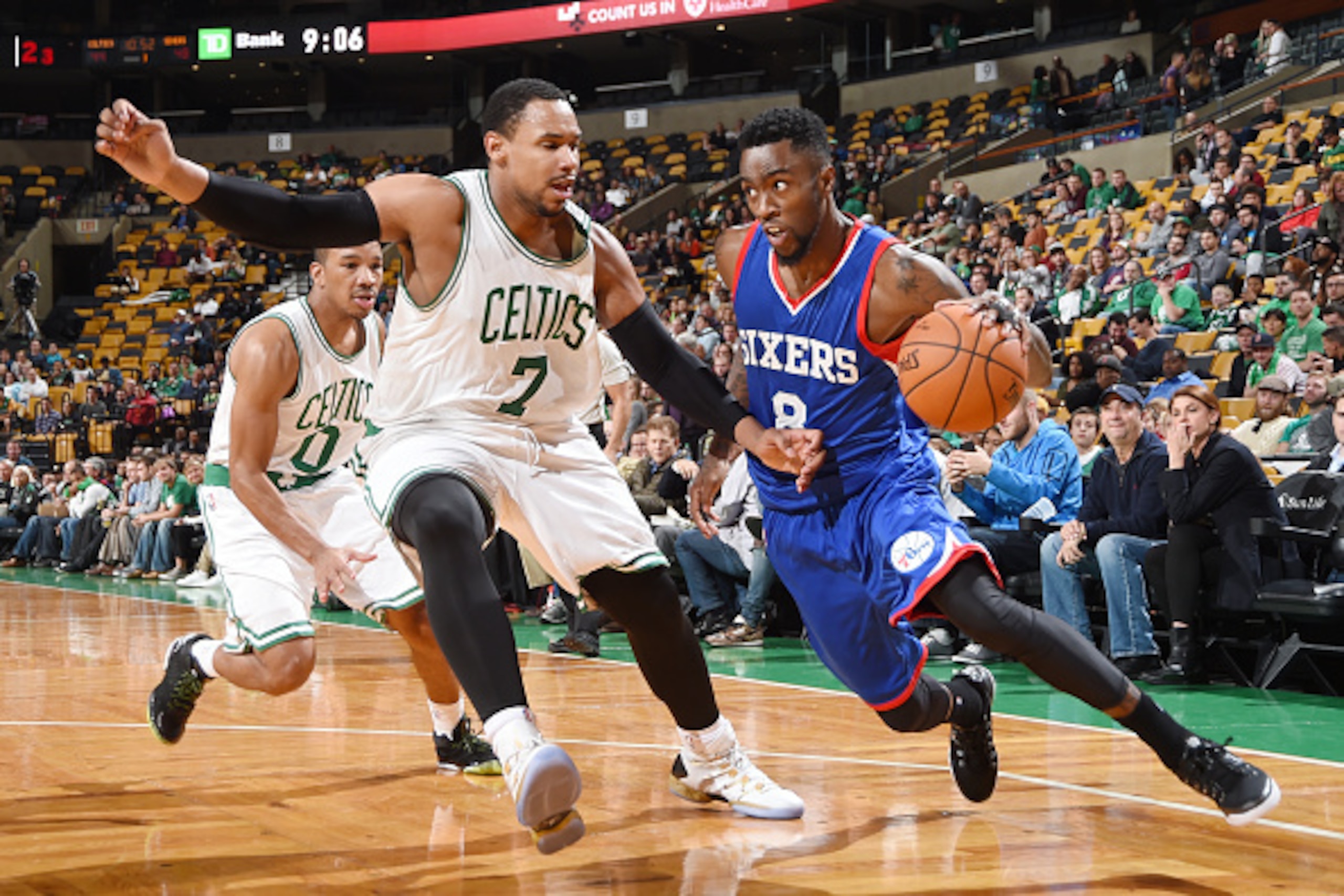 BOSTON, MA - OCTOBER 6: Tony Wroten #8 of the Philadelphia 76ers drives the ball against Jared Sullinger #7 of the Boston Celtics on October 6, 2014 at the TD Garden in Boston, Massachusetts.  NOTE TO USER: User expressly acknowledges and agrees that, by 