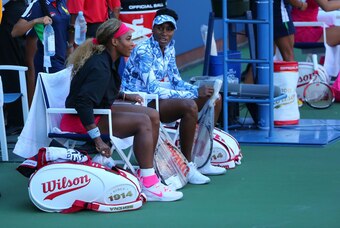 Aug 28, 2014; New York, NY, USA;  Venus Williams (USA) and Serena Williams (USA)  before playing Timea Babos (HUN) and Kristina Mladenovic (FRA) on the Grandstand Court on day four of the 2014 U.S. Open tennis tournament at USTA Billie Jean King National