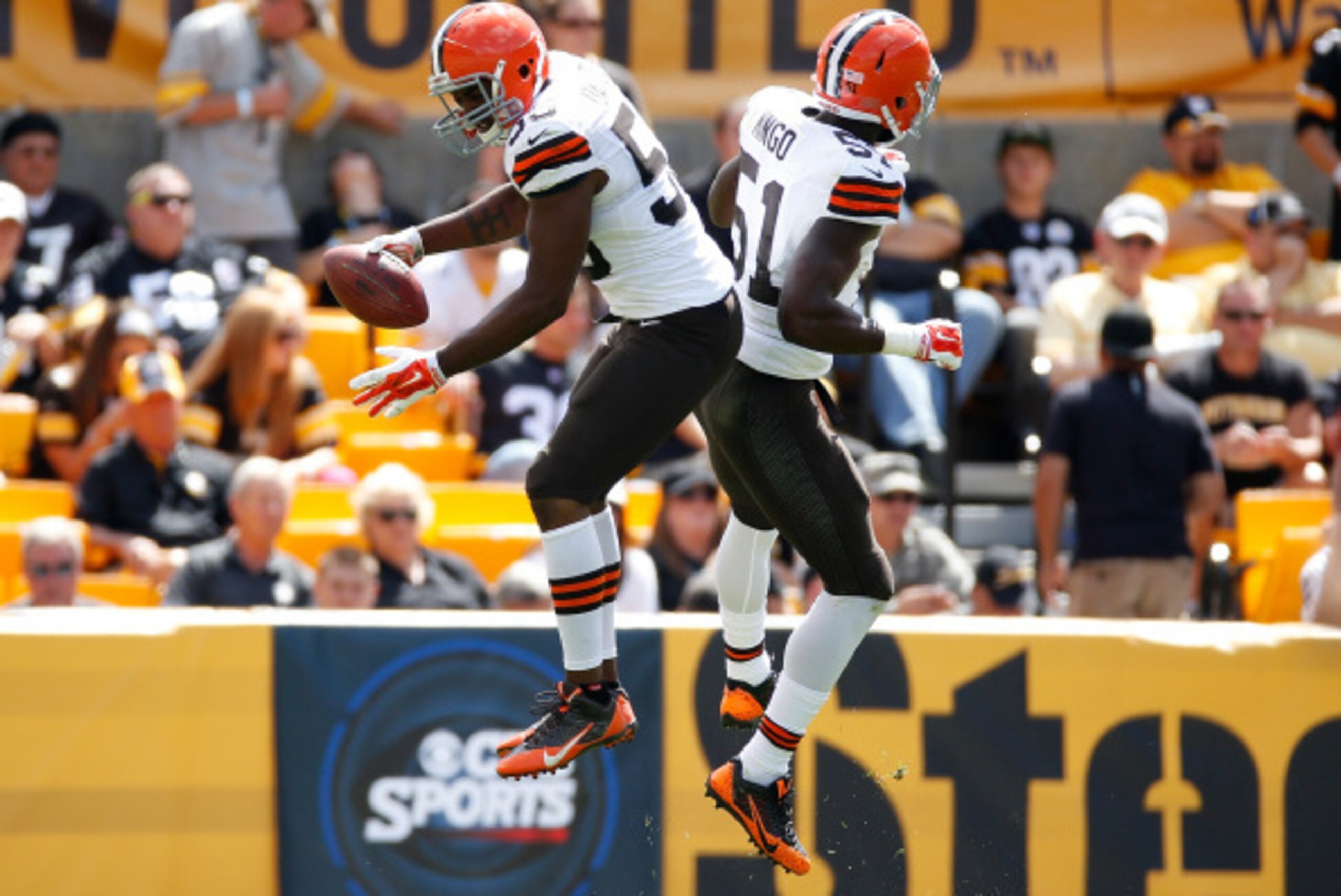 PITTSBURGH, PA - SEPTEMBER 7:  Karlos Dansby #56 of the Cleveland Browns celebrates his interception with Barkevious Mingo #51during the second quarter at Heinz Field on September 7, 2014 in Pittsburgh, Pennsylvania.  (Photo by Gregory Shamus/Getty Images
