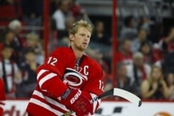 Oct 10, 2014; Raleigh, NC, USA; Carolina Hurricanes forward Eric Staal (12) before the game against the New York Islanders at PNC Arena. The New York Islanders defeated the Carolina Hurricanes 5-3. Mandatory Credit: James Guillory-USA TODAY Sports