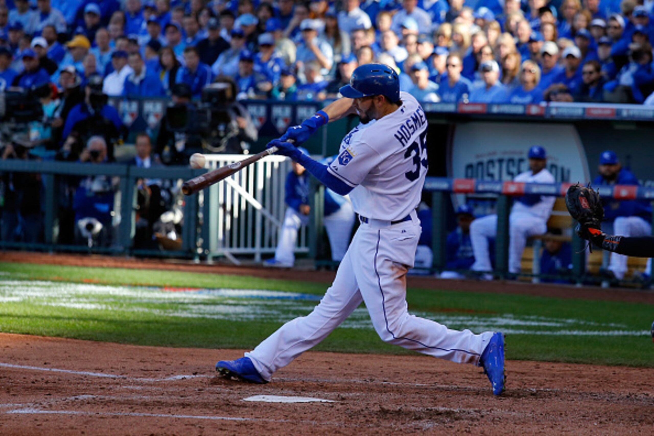 KANSAS CITY, MO - OCTOBER 15:  Eric Hosmer #35 of the Kansas City Royals hits a single in the third inning against Miguel Gonzalez #50 of the Baltimore Orioles during Game Four of the American League Championship Series at Kauffman Stadium on October 15, 