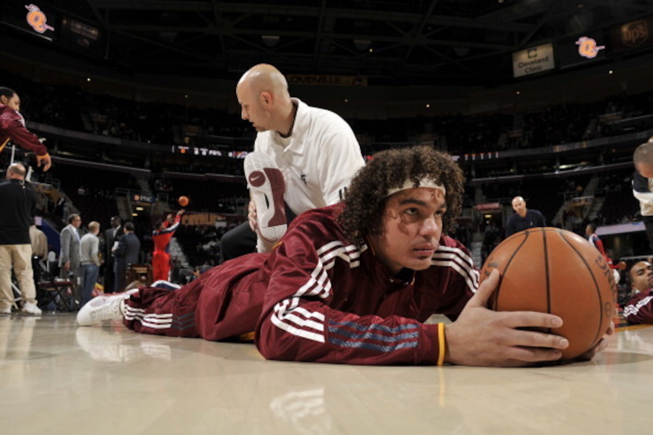 CLEVELAND - NOVEMBER 2:  Anderson Varejao #17 of the Cleveland Cavaliers stretches out with assistance from physical therapist George Sibel before the game against the Atlanta Hawks at The Quicken Loans Arena on November 2, 2010 in Cleveland, Ohio. NOTE T