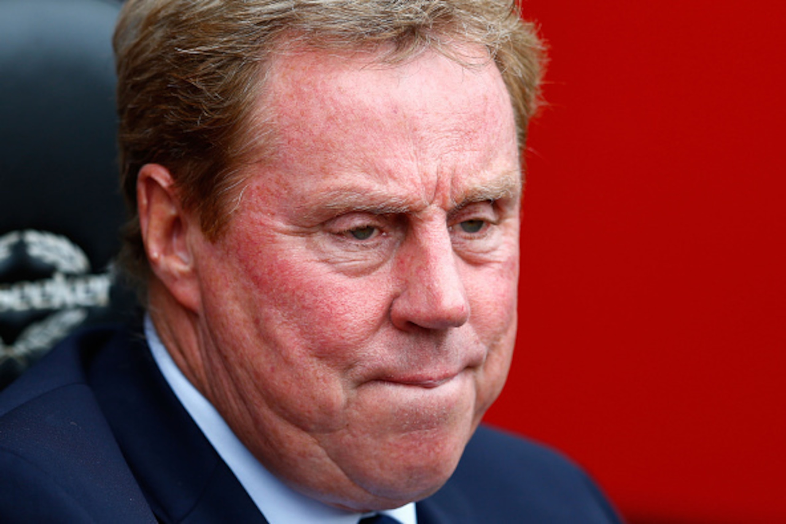 SOUTHAMPTON, ENGLAND - SEPTEMBER 27:  Harry Redknapp the manager of QPR looks on during the Barclays Premier League match between Southampton and QPR at St Mary's Stadium on September 27, 2014 in Southampton, England.  (Photo by Julian Finney/Getty Images