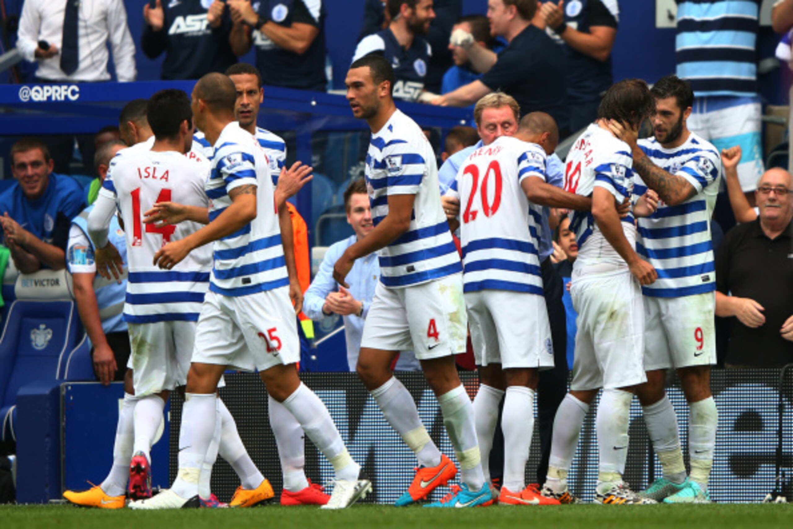 LONDON, ENGLAND - SEPTEMBER 20:  Niko Kranjcar (2ndR) of QPR celebrates with team mates and Harry Redknapp, manager of QPR after scoring with a free kick during the Barclays Premier League match between Queens Park Rangers and Stoke City at Loftus Road on