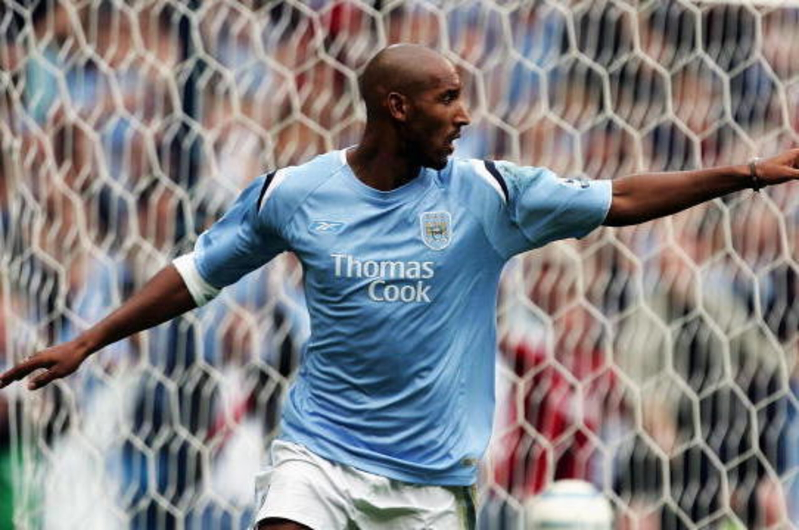 MANCHESTER, ENGLAND - AUGUST 28:  Nicolas Anelka of Manchester City celebrates his 2nd goal during the Barclays Premiership match between Manchester City and Charlton Athletic at The City of Manchester Stadium on August 28, 2004 in Manchester, England.  (