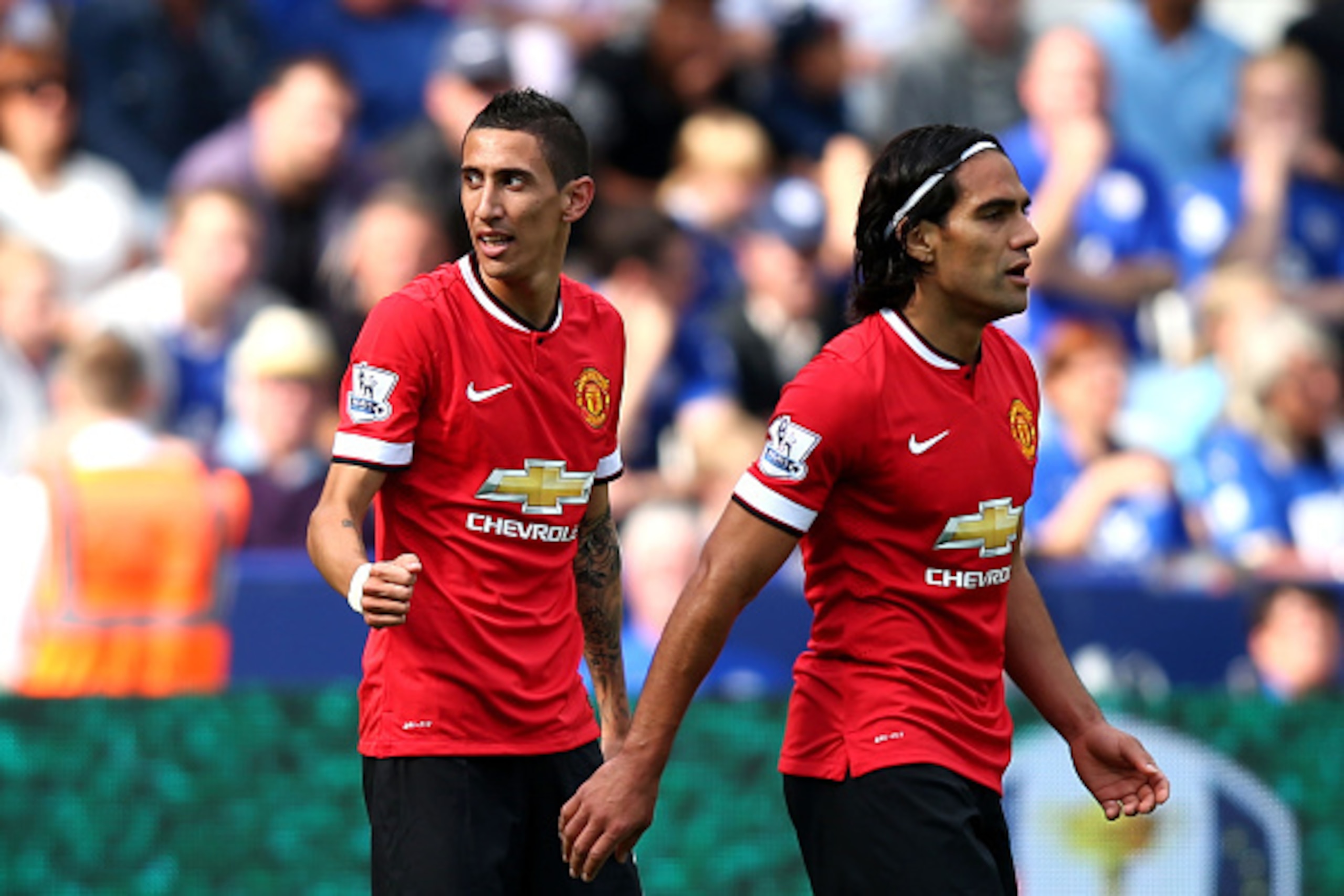 LEICESTER, ENGLAND - SEPTEMBER 21:  Angel di Maria (L) of Manchester United celebrates after scoring his team's second goal during the Barclays Premier League match between Leicester City and Manchester United at The King Power Stadium on September 21, 20