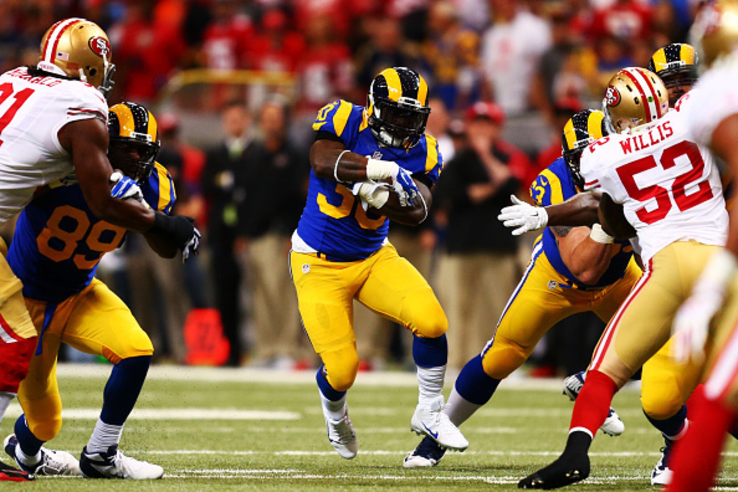 ST LOUIS, MO - OCTOBER 13: Zac Stacy #30 of the St. Louis Rams at Edward Jones Dome carries the ball in the first quarter against the San Francisco 49ers on October 13, 2014 in St Louis, Missouri. (Photo by Dilip Vishwanat/Getty Images) ST LOUIS, MO - OCTOBER 13: Zac Stacy #30 of the St. Louis Rams at Edward Jones Dome carries the ball in the first quarter against the San Francisco 49ers on October 13, 2014 in St Louis, Missouri. (Photo by Dilip Vishwanat/Getty Images)