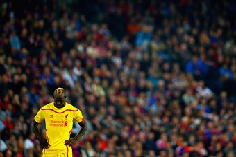 BASEL, SWITZERLAND - OCTOBER 01:  A dejected Mario Balotelli of Liverpool during the UEFA Champions League Group B match between FC Basel 1893 and Liverpool FC at St. Jakob Stadium on October 1, 2014 in Basel, Switzerland.  (Photo by Jamie McDonald/Getty 