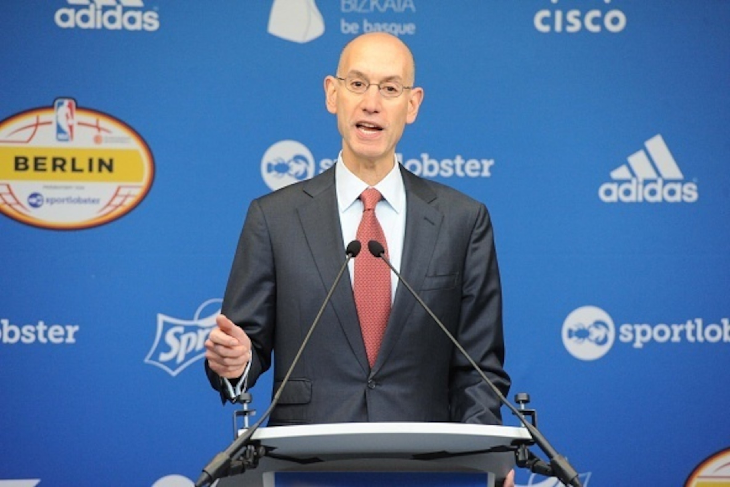 BERLIN - OCTOBER 8: NBA Commissioner Adam Silver talks to the media prior to the San Antonio Spurs versus Alba Berlin game as part of the 2014 Global Games on October 8, 2014 at the O2 Arena in Berlin, Germany. NOTE TO USER: User expressly acknowledges an BERLIN - OCTOBER 8: NBA Commissioner Adam Silver talks to the media prior to the San Antonio Spurs versus Alba Berlin game as part of the 2014 Global Games on October 8, 2014 at the O2 Arena in Berlin, Germany. NOTE TO USER: User expressly acknowledges an