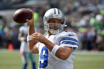 SEATTLE, WA - OCTOBER 12:  quarterback Tony Romo #9 of the Dallas Cowboys warms up before the game aagainst the Seattle Seahawks at CenturyLink Field on October 12, 2014 in Seattle, Washington.  (Photo by Steve Dykes/Getty Images)