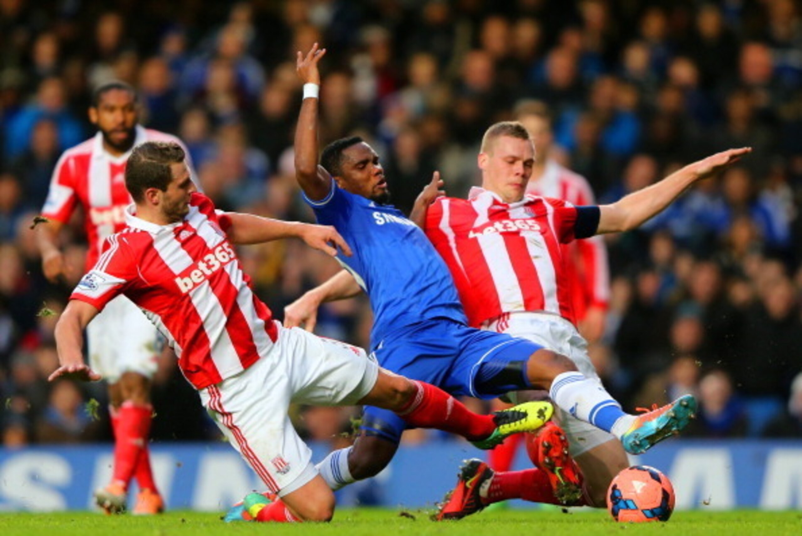 LONDON, ENGLAND - JANUARY 26: Erik Pieters and Ryan Shawcross of Stoke City tackle Samuel Eto'o of Chelsea during the FA Cup Fourth Round between Chelsea and Stoke City at Stamford Bridge on January 26, 2014 in London, England. (Photo by Ian Walton/Gett LONDON, ENGLAND - JANUARY 26: Erik Pieters and Ryan Shawcross of Stoke City tackle Samuel Eto'o of Chelsea during the FA Cup Fourth Round between Chelsea and Stoke City at Stamford Bridge on January 26, 2014 in London, England. (Photo by Ian Walton/Gett