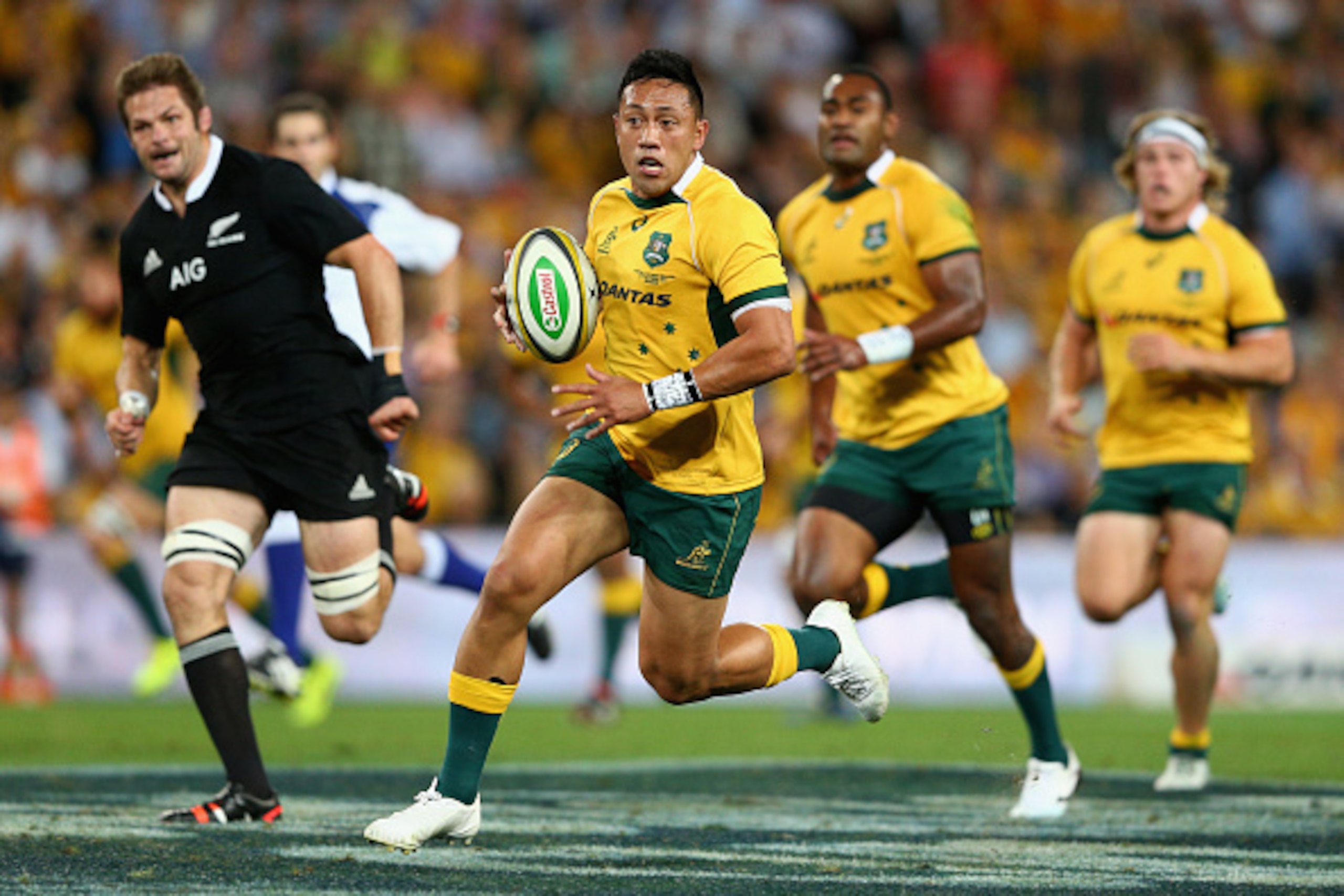 BRISBANE, AUSTRALIA - OCTOBER 18:  Christian Leali'ifano of the Wallabies makes a break during The Rugby Championship match between the Australian Wallabies and the New Zealand All Blacks at Suncorp Stadium on October 18, 2014 in Brisbane, Australia.  (Ph