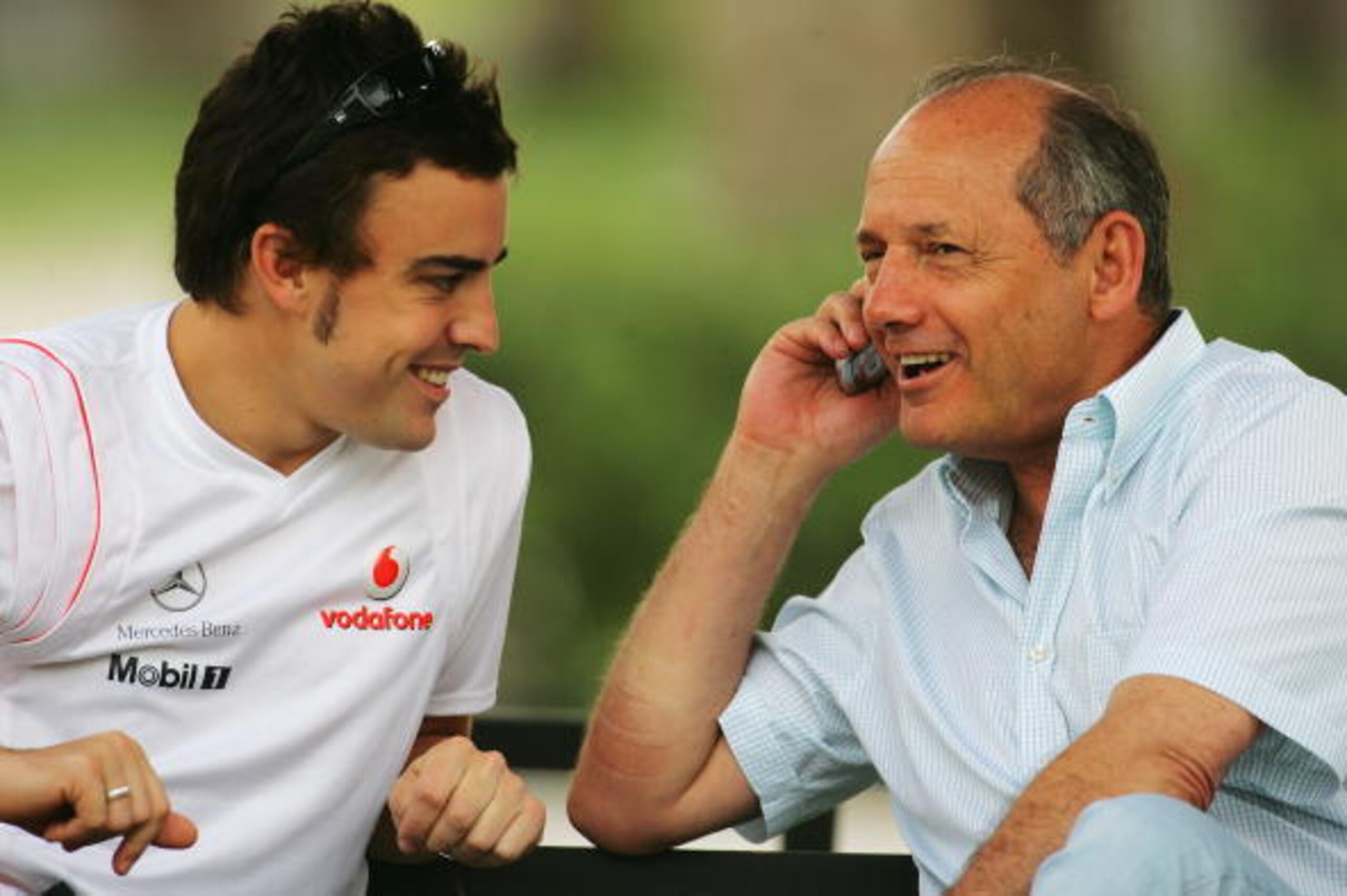 SAKHIR, BAHRAIN - APRIL 12:  Fernando Alonso (L) of Spain and McLaren Mercedes talks with his Team Principal Ron Dennis (R) in the paddock during the build up to the Bahrain Formula One Grand Prix at the Bahrain International Circuit on April 12, 2007 in 