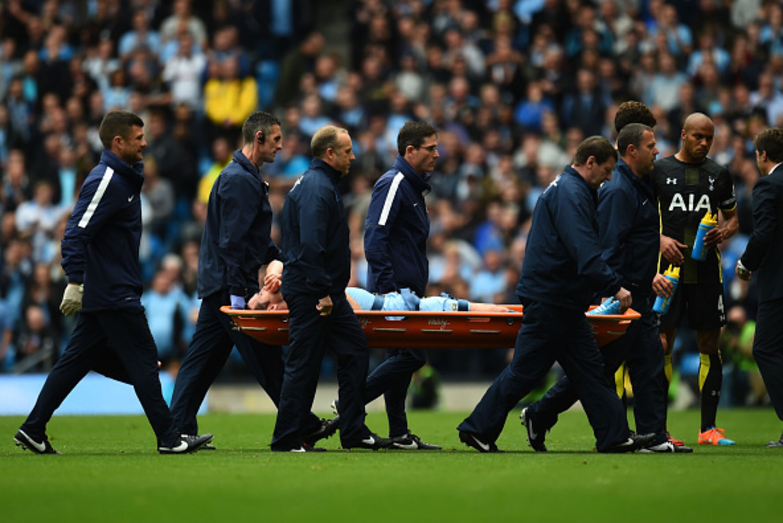 MANCHESTER, ENGLAND - OCTOBER 18:  The injured Frank Lampard of Manchester City is stretchered off the pitch during the Barclays Premier League match between Manchester City and Tottenham Hotspur at Etihad Stadium on October 18, 2014 in Manchester, Englan