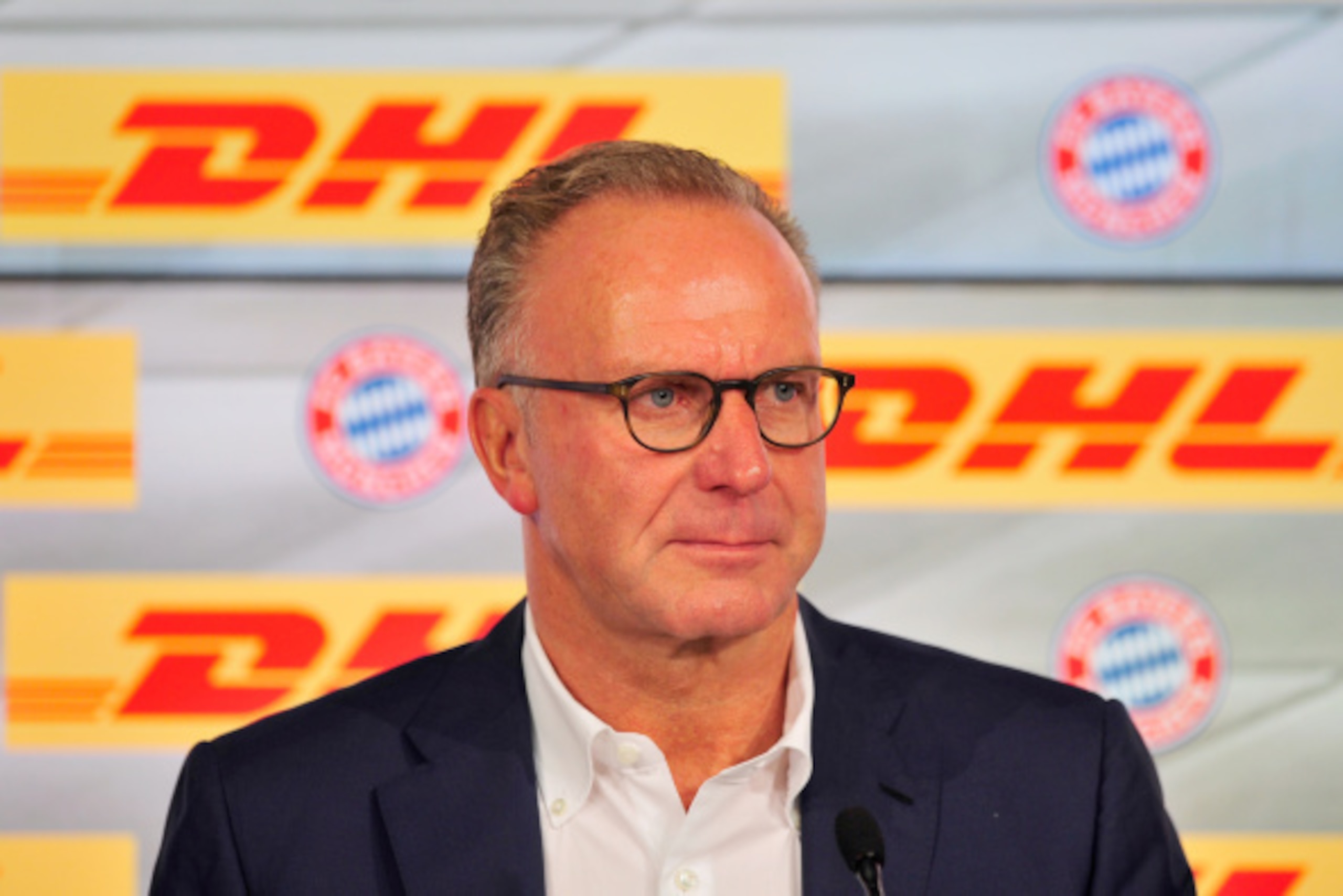MUNICH, GERMANY - AUGUST 22:  Karl-Heinz Rummenigge, CEO of FC Bayern Muenchen AG, addresses the media during a press conference on the new partnership between FC Bayern Muenchen and DHL at Allianz Arena on August 22, 2014 in Munich, Germany.  (Photo by L