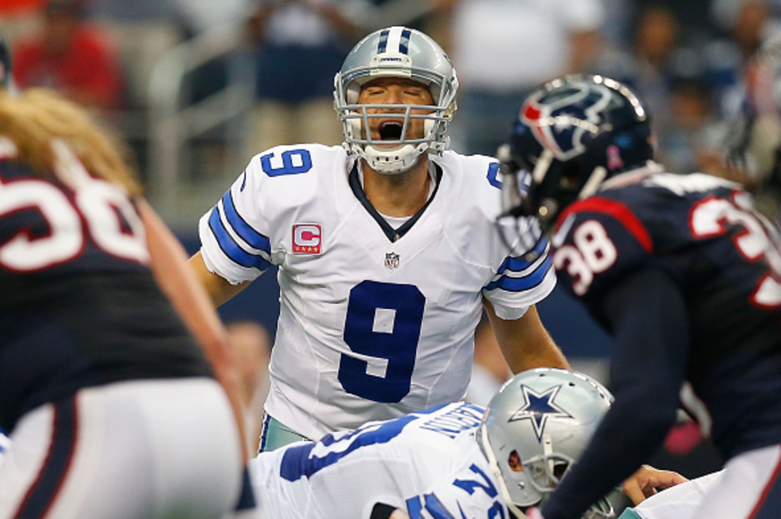 ARLINGTON, TX - OCTOBER 05:  Tony Romo #9 of the Dallas Cowboys calls signals against the Houston Texans in the second half at AT&T Stadium on October 5, 2014 in Arlington, Texas.  (Photo by Tom Pennington/Getty Images)
