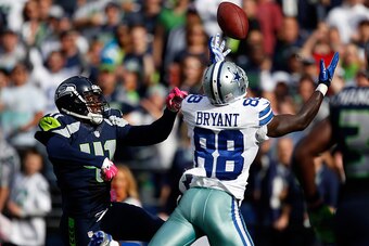 SEATTLE, WA - OCTOBER 12: Cornerback Byron Maxwell #41 of the Seattle Seahawks breaks up a pass intended for wide receiver Dez Bryant #88 of the Dallas Cowboys during the second quarter of the game at CenturyLink Field on October 12, 2014 in Seattle, Wash