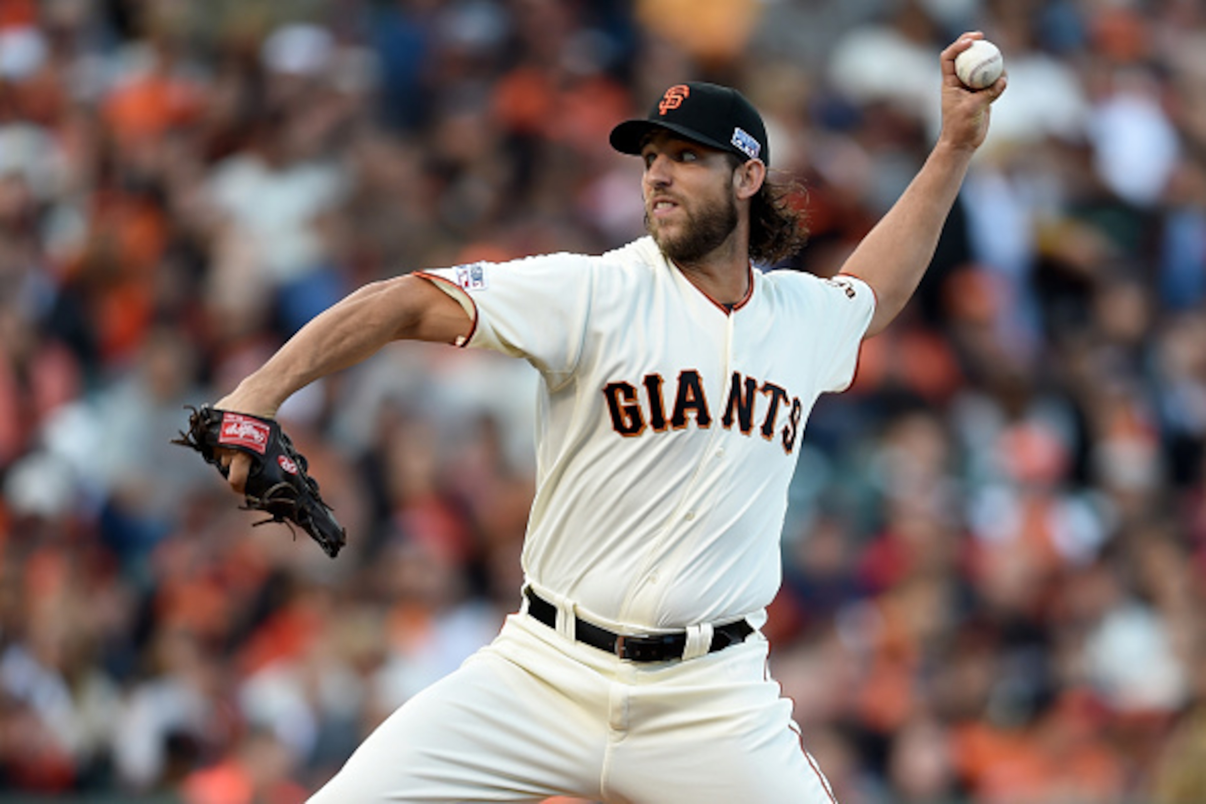 SAN FRANCISCO, CA - OCTOBER 16:  Madison Bumgarner #40 of the San Francisco Giants pitches in the first inning while taking on the St. Louis Cardinals during Game Five of the National League Championship Series at AT&T Park on October 16, 2014 in San Fran
