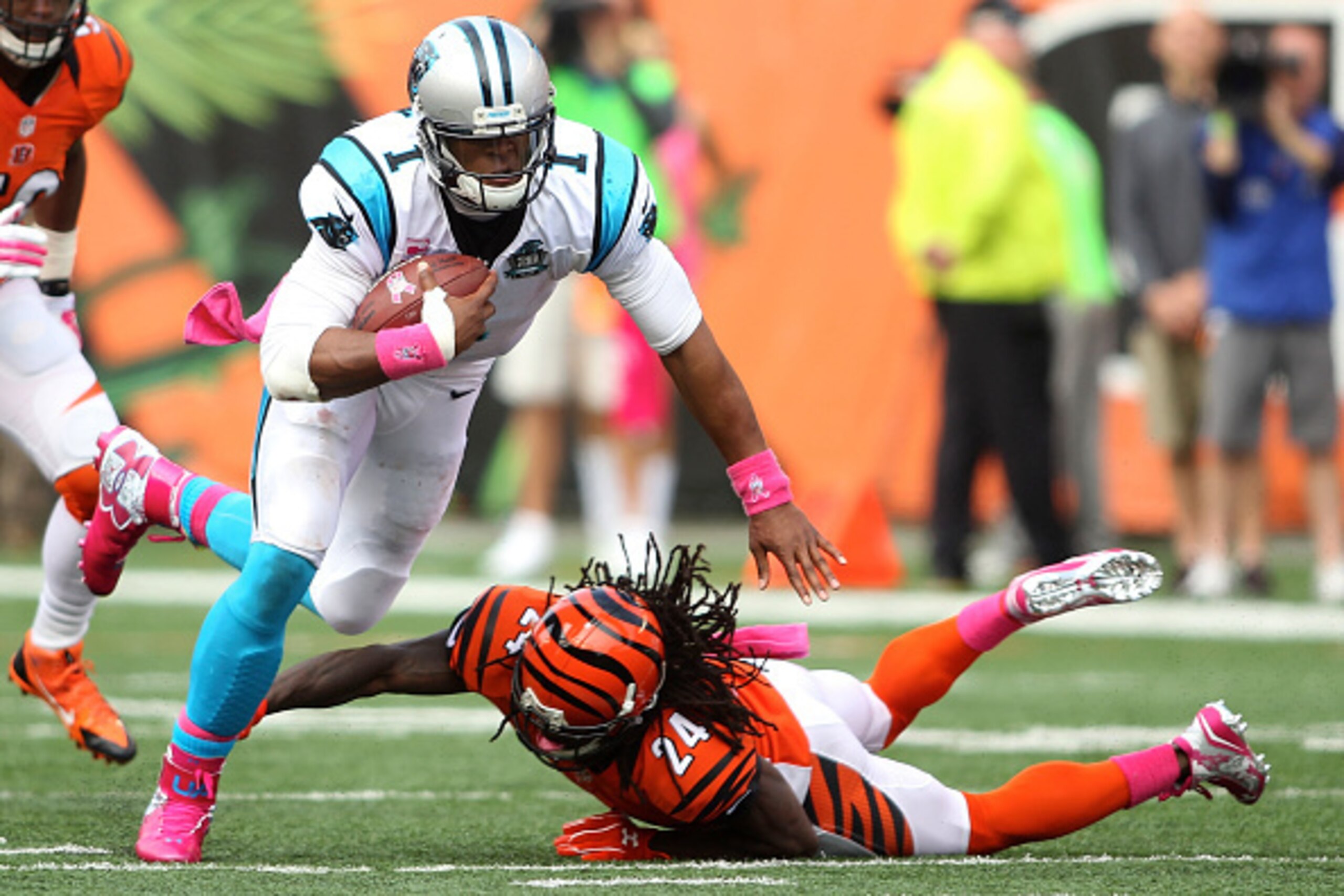 CINCINNATI, OH - OCTOBER 12:  Adam Jones #24 of the Cincinnati Bengals trips up Cam Newton #1 of the Carolina Panthers during the fourth quarter at Paul Brown Stadium on October 12, 2014 in Cincinnati, Ohio. (Photo by John Grieshop/Getty Images)
