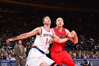 NEW YORK, NY - OCTOBER 13:  Jason Smith #14 of the New York Knicks boxes out Greg Stiemsma #34 of the Toronto Raptors during a game at Madison Square Garden on October 13, 2014 in New York City, New York. NOTE TO USER: User expressly acknowledges and agre