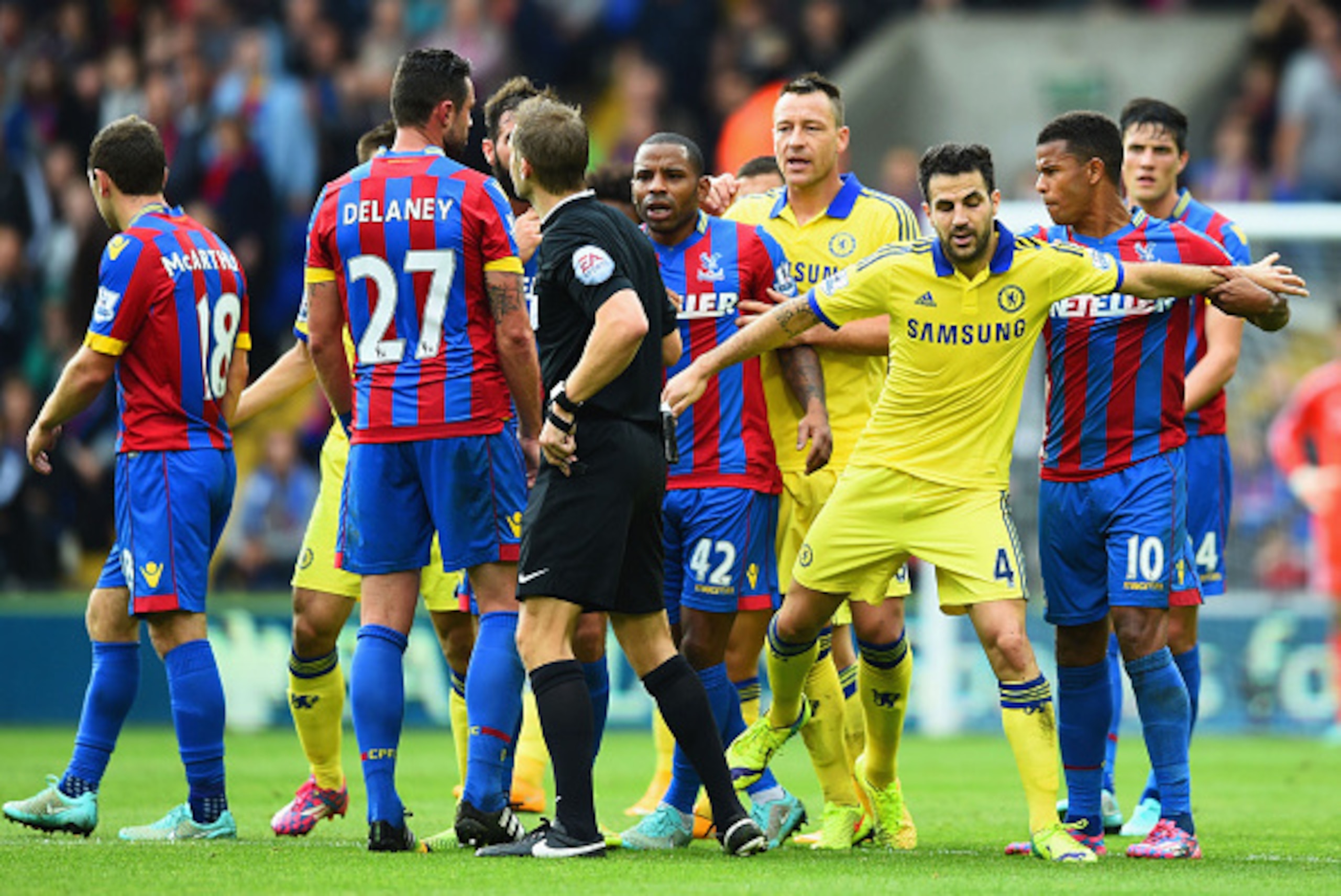 LONDON, ENGLAND - OCTOBER 18:  Fraizer Campbell of Crystal Palace (10) clashes with Cesc Fabregas of Chelsea (4) during the Barclays Premier League match between Crystal Palace and Chelsea at Selhurst Park on October 18, 2014 in London, England.  (Photo b