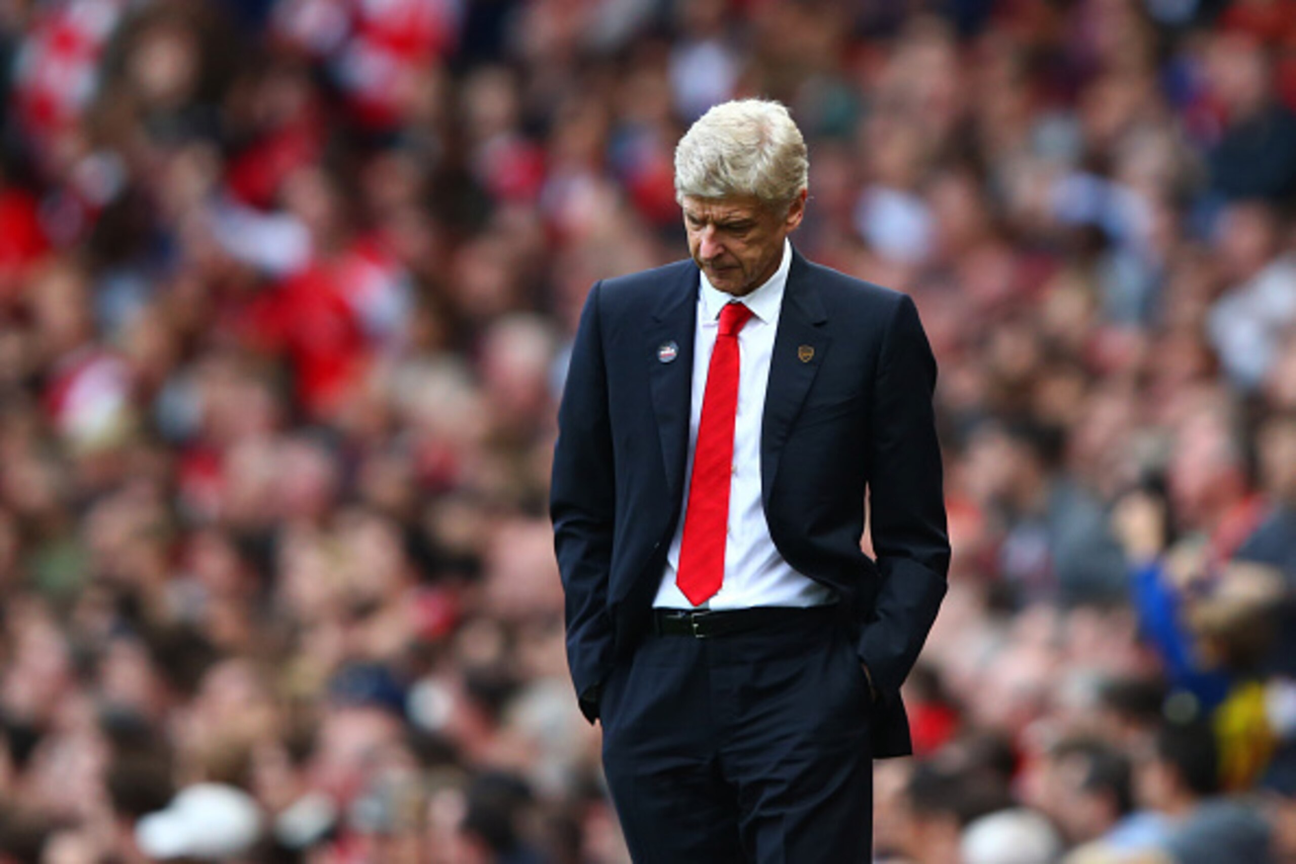 LONDON, ENGLAND - OCTOBER 18:  Arsene Wenger, manager of Arsenal reacts during the Barclays Premier League match between Arsenal and Hull City at Emirates Stadium on October 18, 2014 in London, England.  (Photo by Clive Rose/Getty Images)
