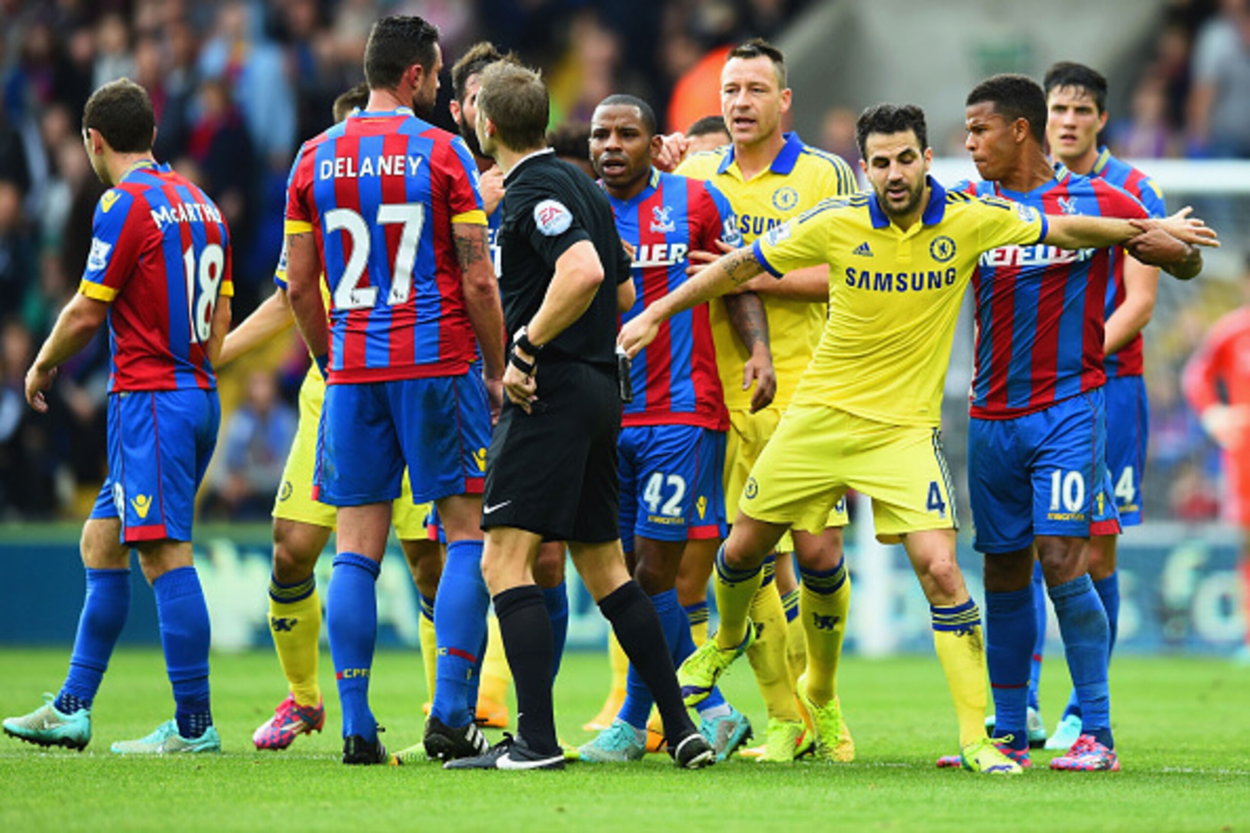 LONDON, ENGLAND - OCTOBER 18:  Fraizer Campbell of Crystal Palace (10) clashes with Cesc Fabregas of Chelsea (4) during the Barclays Premier League match between Crystal Palace and Chelsea at Selhurst Park on October 18, 2014 in London, England.  (Photo b