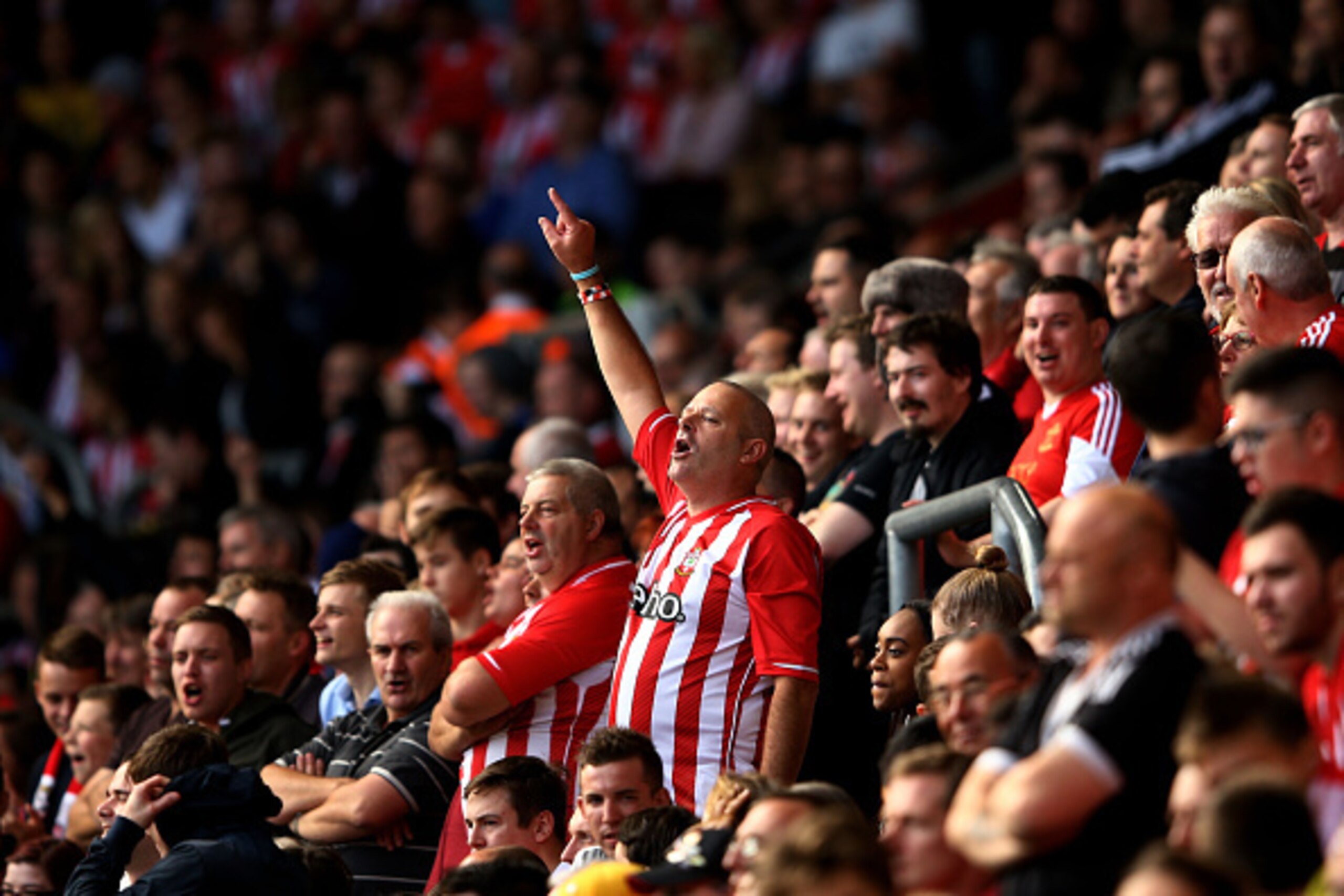 SOUTHAMPTON, ENGLAND - OCTOBER 18:  Southampton fans show their support during the Barclays Premier League match between Southampton and Sunderland at St Mary's Stadium on October 18, 2014 in Southampton, England.  (Photo by Richard Heathcote/Getty Images