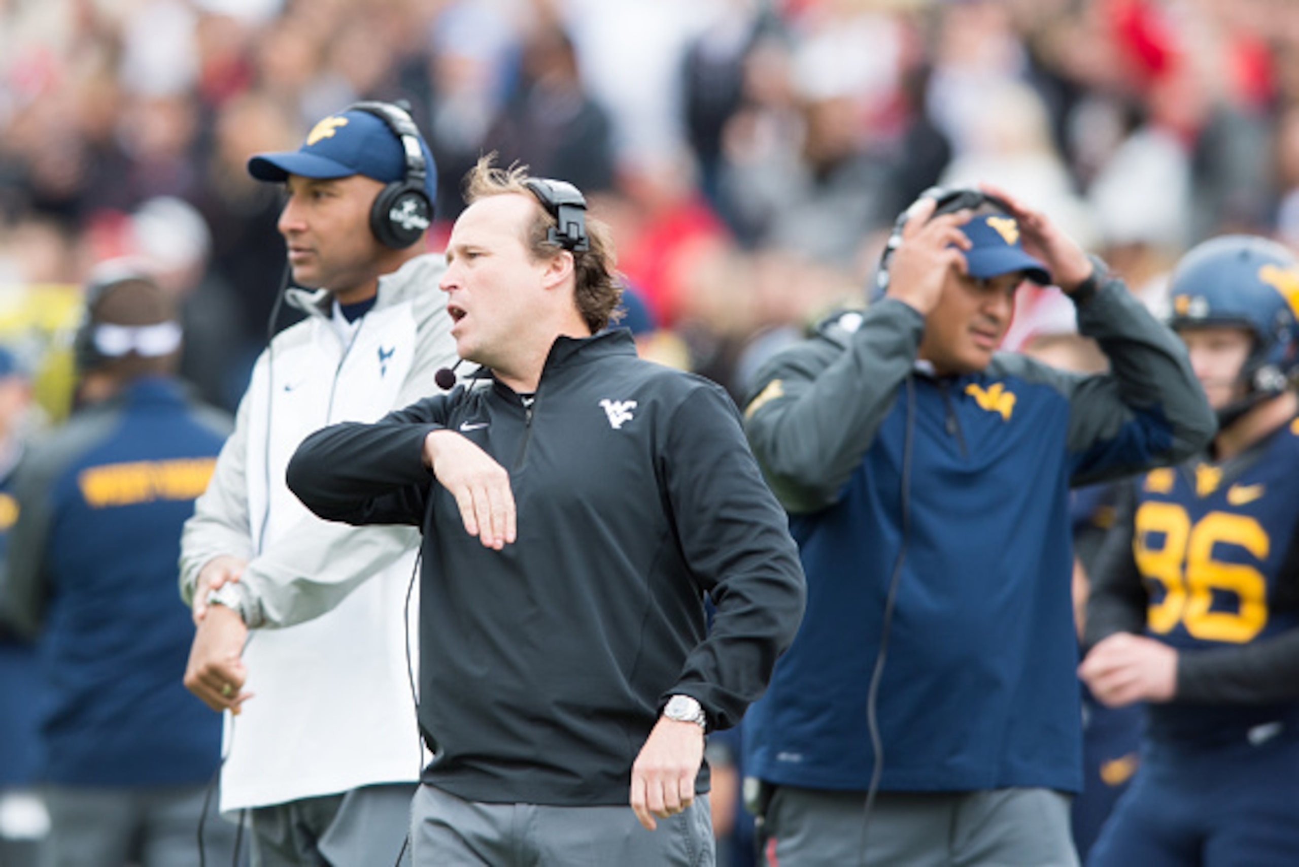 LUBBOCK, TX - OCTOBER 11: Head coach Dana Holgorsen of the West Virginia Mountaineers  during game action against the Texas Tech Red Raiders on October 11, 2014 at Jones AT&T Stadium in Lubbock, Texas. West Virginia won the game  37-34. (Photo by John Wea