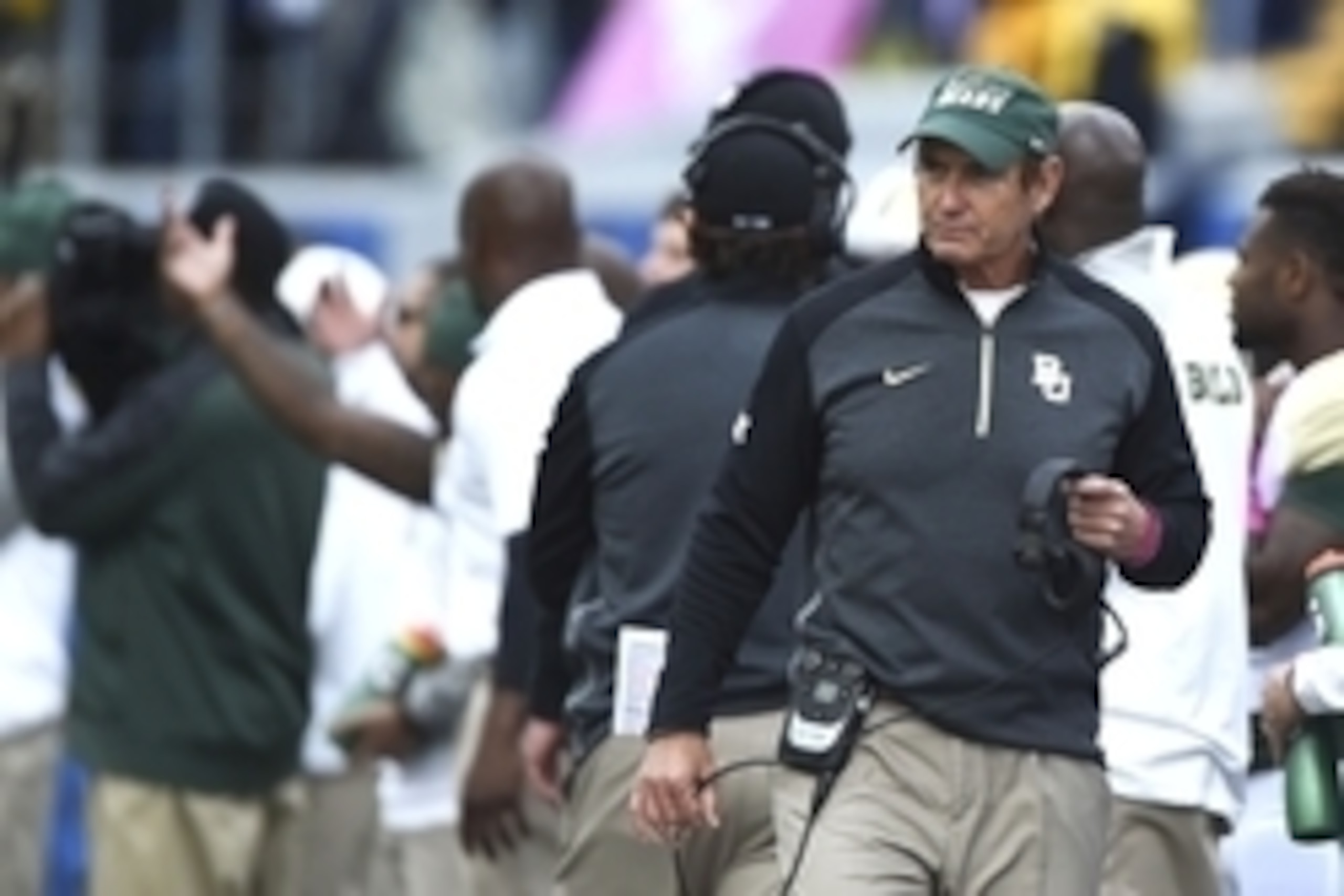 Oct 18, 2014; Morgantown, WV, USA;  Baylor Bears head coach Art Briles walks down the sideline during the first quarter against the West Virginia Mountaineers at Milan Puskar Stadium. Mandatory Credit: Tommy Gilligan-USA TODAY Sports