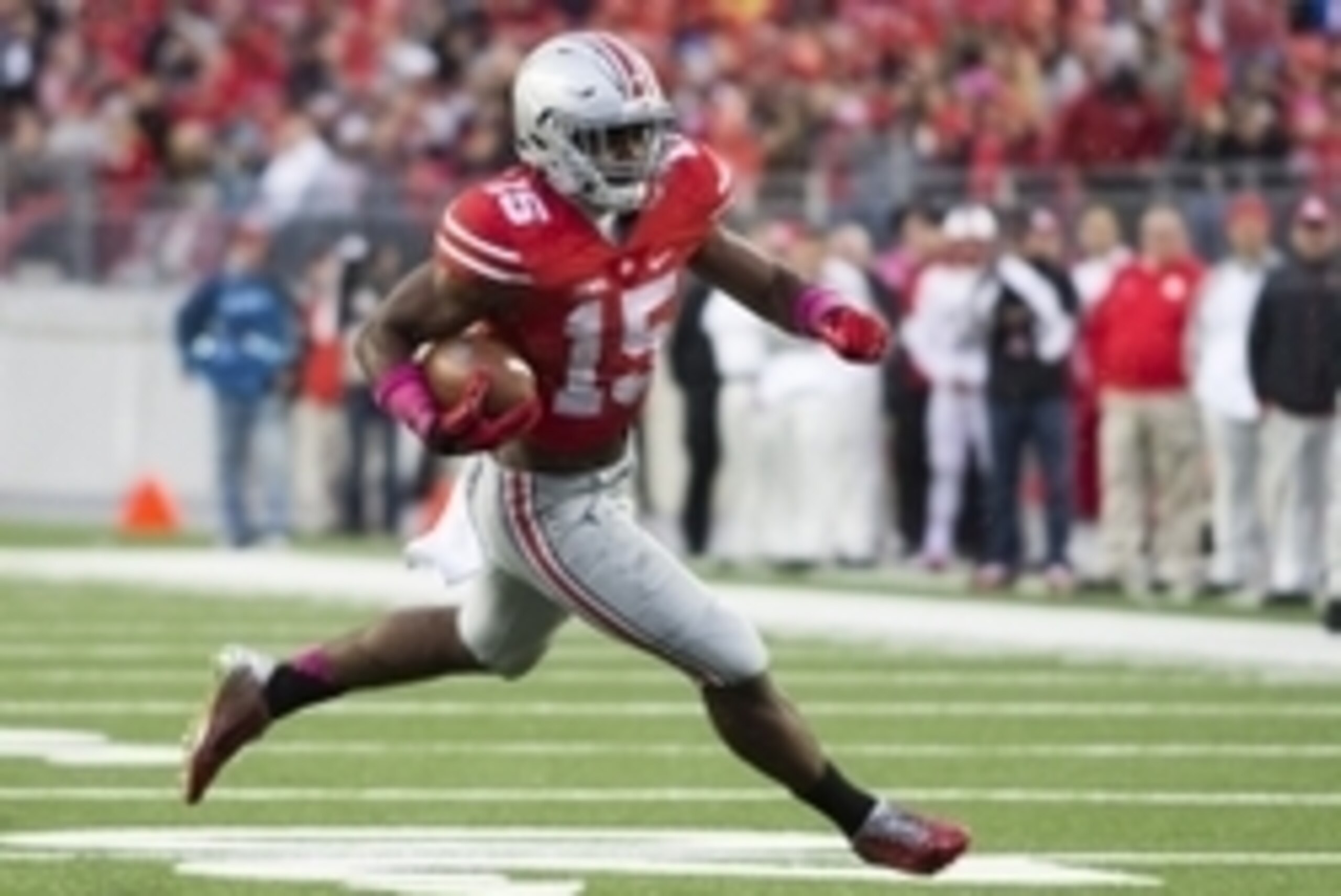Oct 18, 2014; Columbus, OH, USA; Ohio State Buckeyes running back Ezekiel Elliott (15) carries the ball against the Rutgers Scarlet Knights at Ohio Stadium. The Buckeyes won 56-17. Mandatory Credit: Greg Bartram-USA TODAY Sports Oct 18, 2014; Columbus, OH, USA; Ohio State Buckeyes running back Ezekiel Elliott (15) carries the ball against the Rutgers Scarlet Knights at Ohio Stadium. The Buckeyes won 56-17. Mandatory Credit: Greg Bartram-USA TODAY Sports