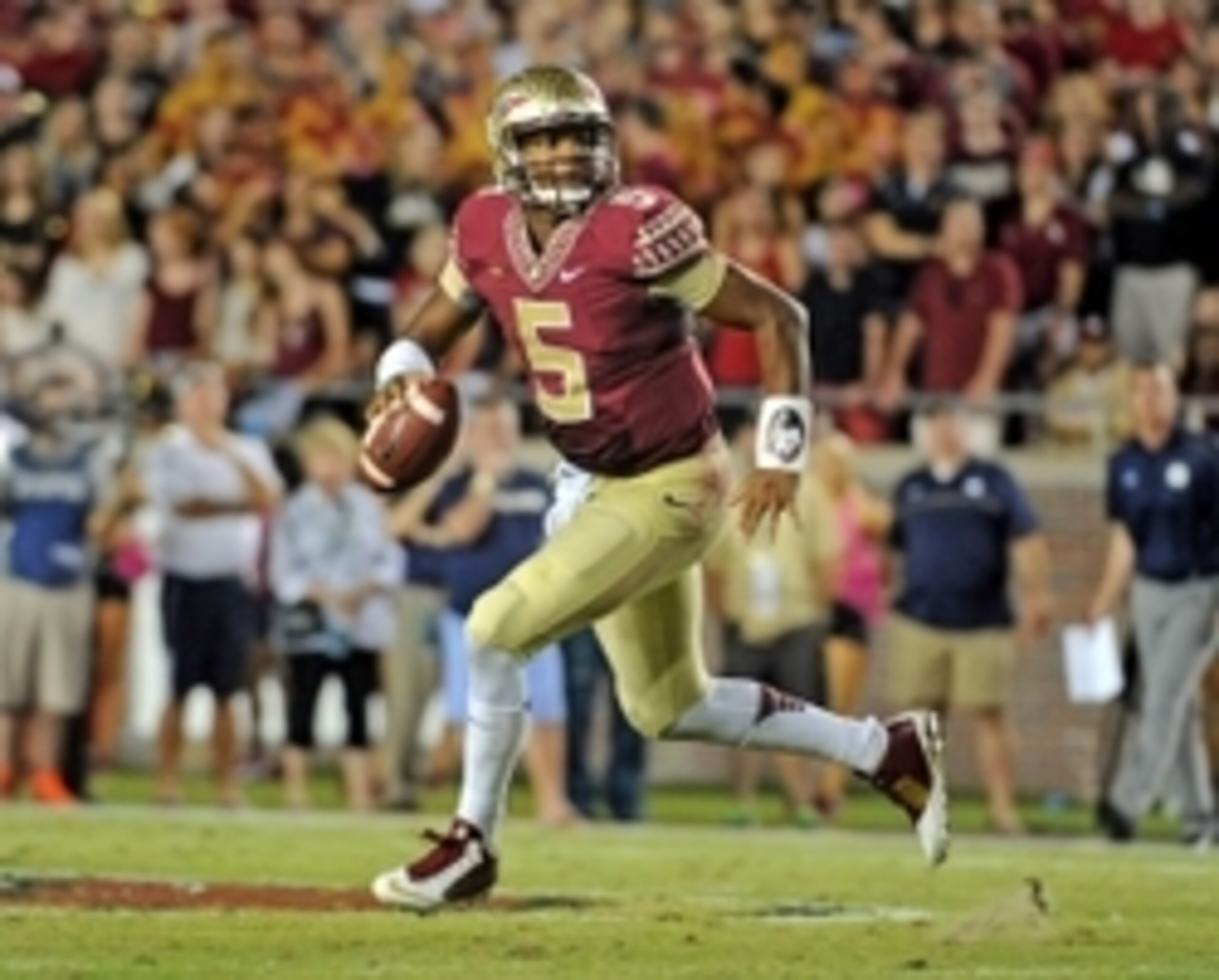 Oct 18, 2014; Tallahassee, FL, USA; Florida State Seminoles quaterback Jameis Winston (5) looks to throw the ball during the first half of the game against the Notre Dame Fighting Irish at Doak Campbell Stadium. Mandatory Credit: Melina Vastola-USA TODAY
