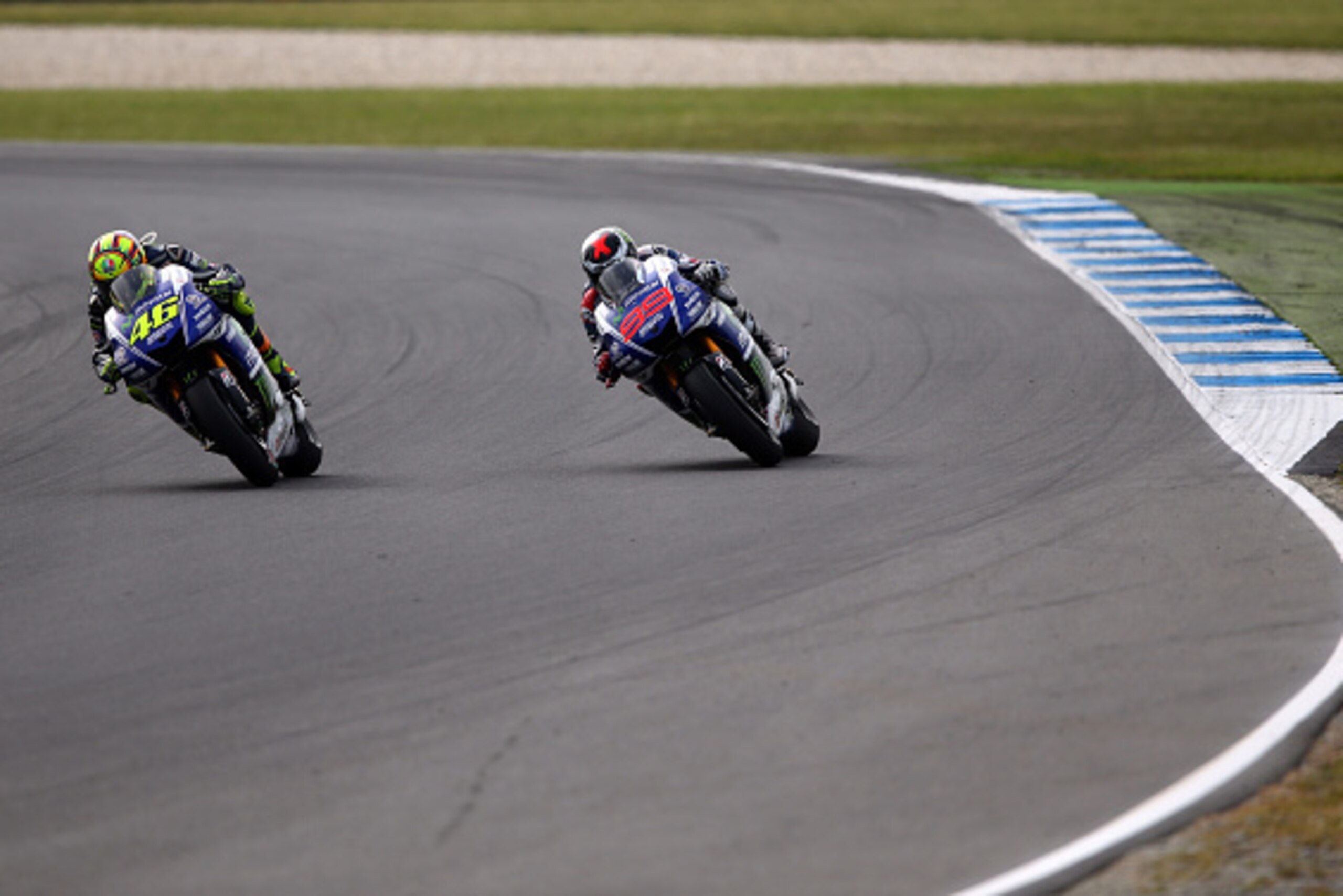 PHILLIP ISLAND, AUSTRALIA - OCTOBER 19:  Valentino Rossi of Italy and riding the #46 Movistar Yamaha MotoGp Yamaha leads Jorge Lorenzo of Spain riding the #99 Movistar Yamaha MotoGp Yamaha during the 2014 MotoGP of Australia at Phillip Island Grand Prix C