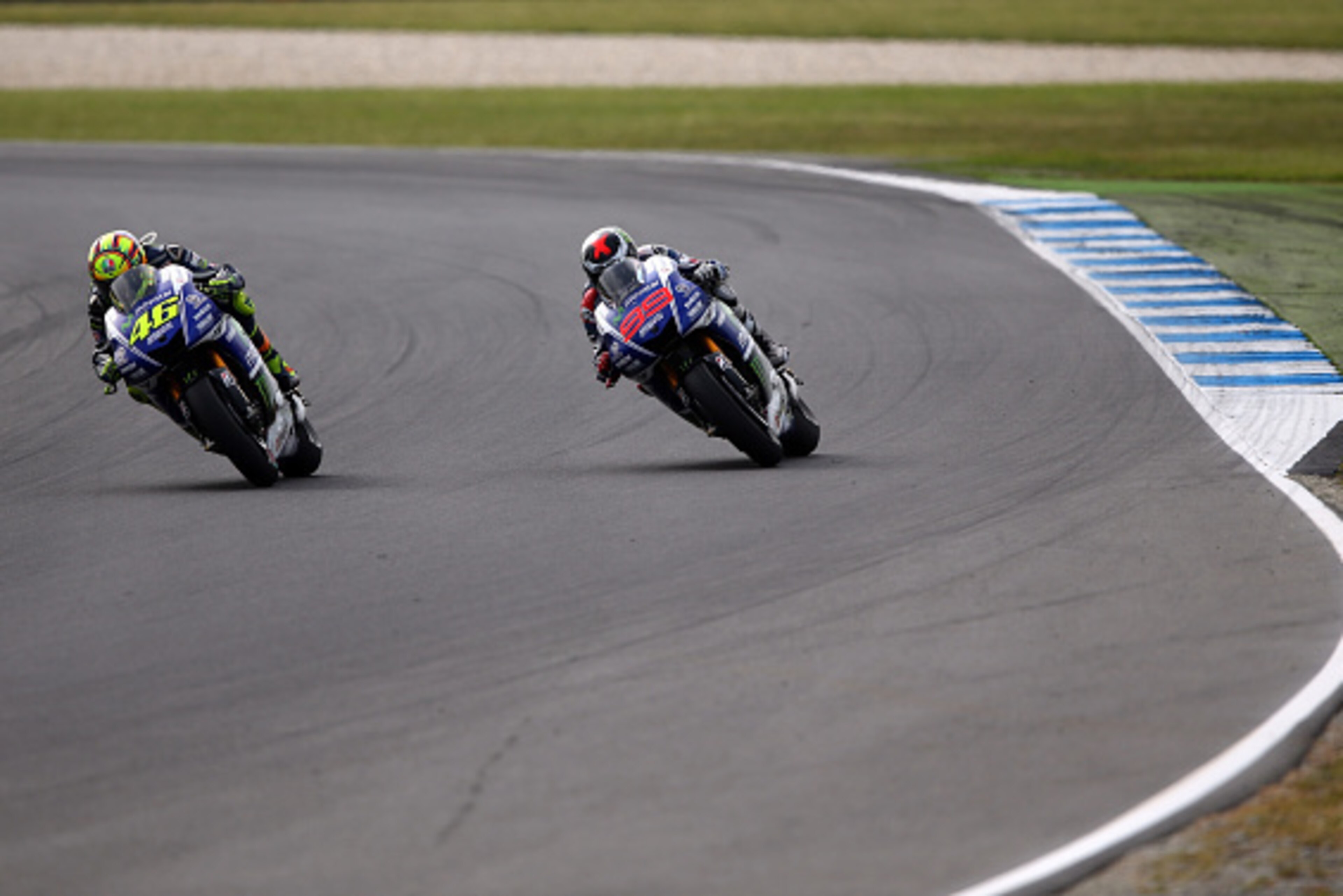 PHILLIP ISLAND, AUSTRALIA - OCTOBER 19:  Valentino Rossi of Italy and riding the #46 Movistar Yamaha MotoGp Yamaha leads Jorge Lorenzo of Spain riding the #99 Movistar Yamaha MotoGp Yamaha during the 2014 MotoGP of Australia at Phillip Island Grand Prix C